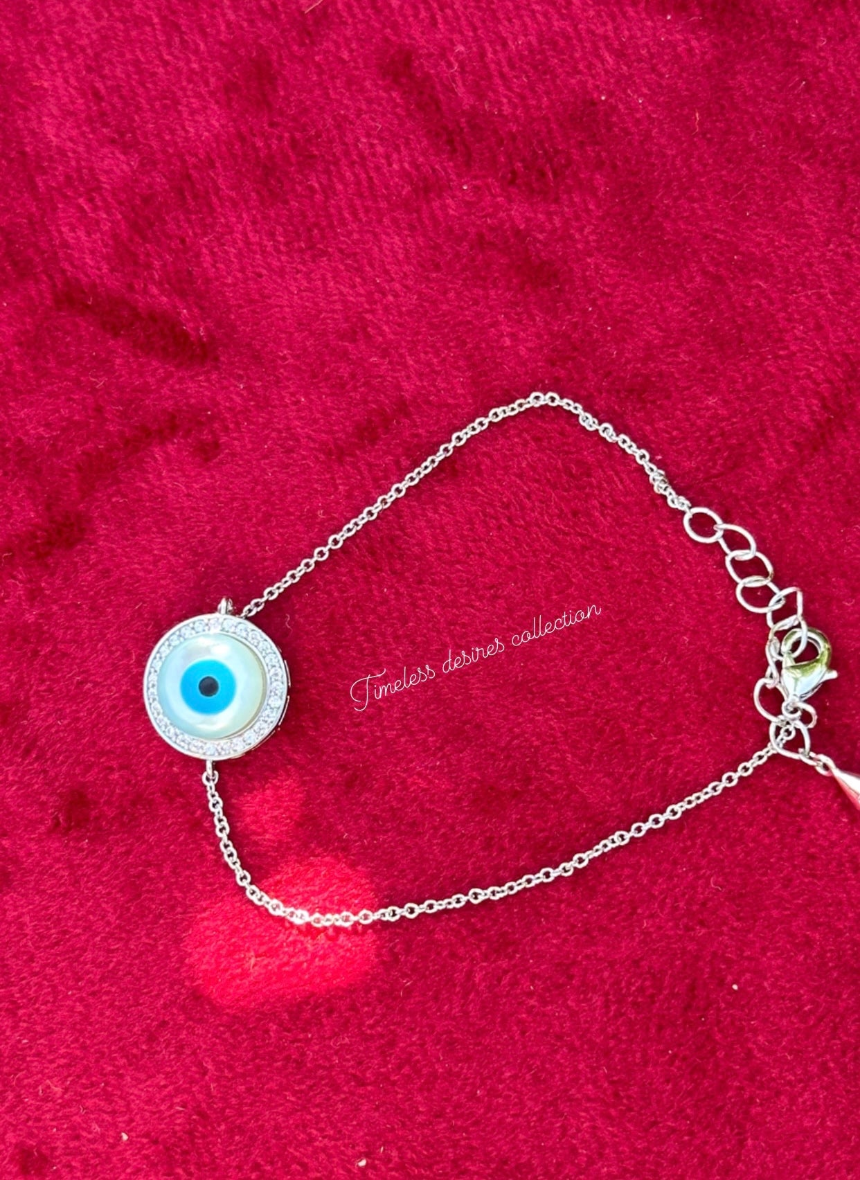 Evil eye adjustable size bracelet in American diamond on silver polish