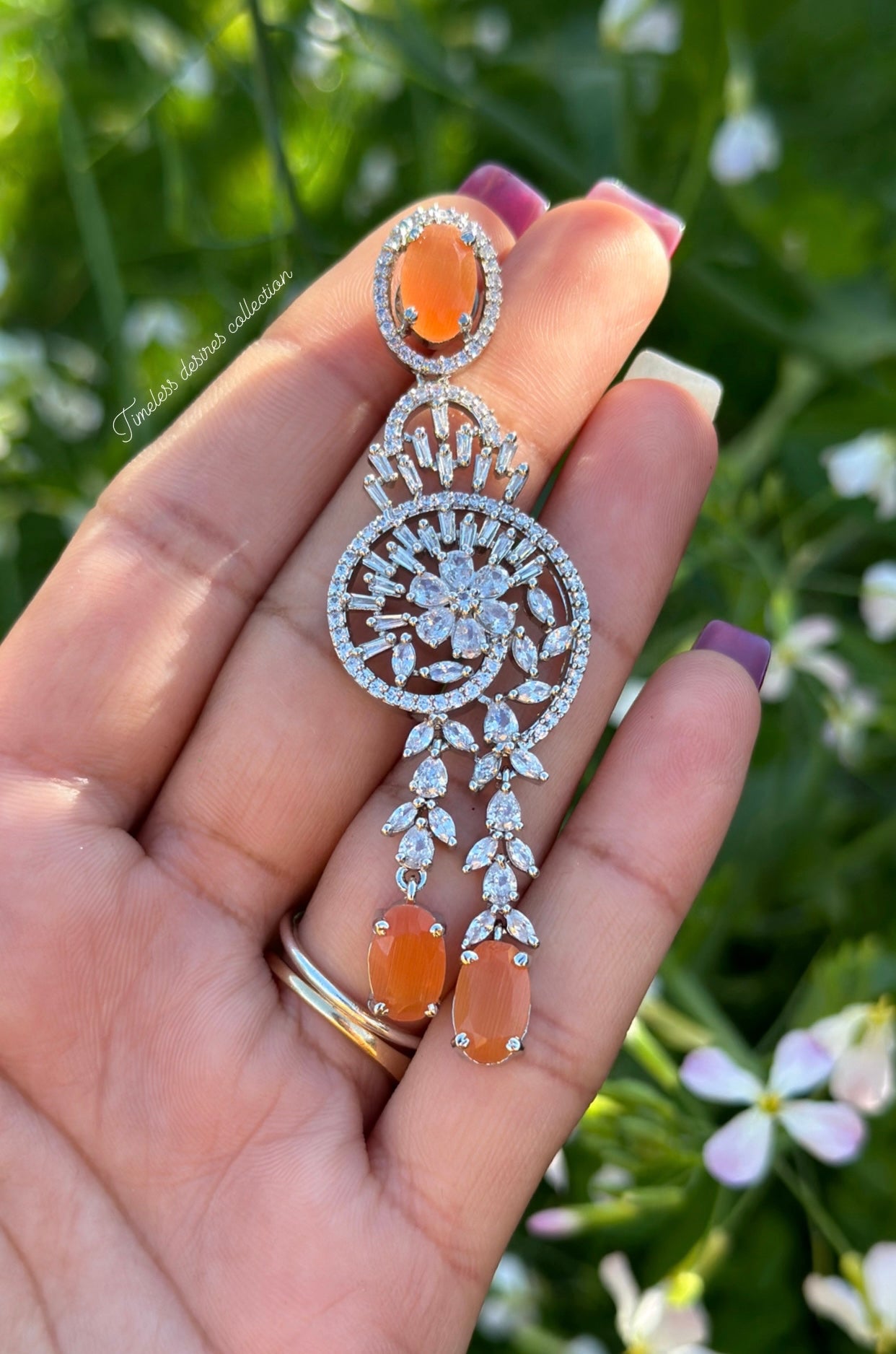 American diamond earrings ( statement PC )