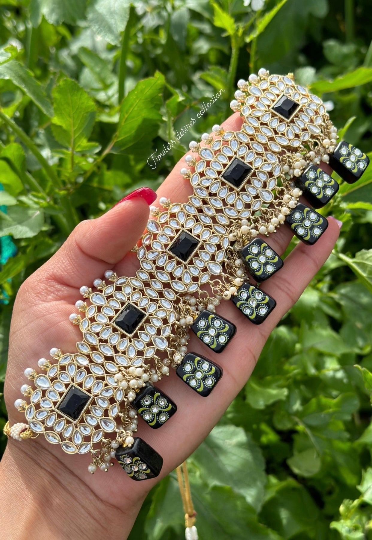 Black choker / necklace set in Kundan with tumbler beads in meenakari with Jhumka included Sahara chains