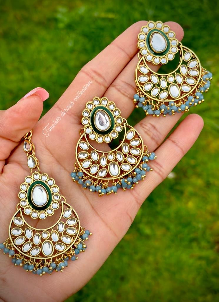 Sky blue earrings and tikka set in Kundan