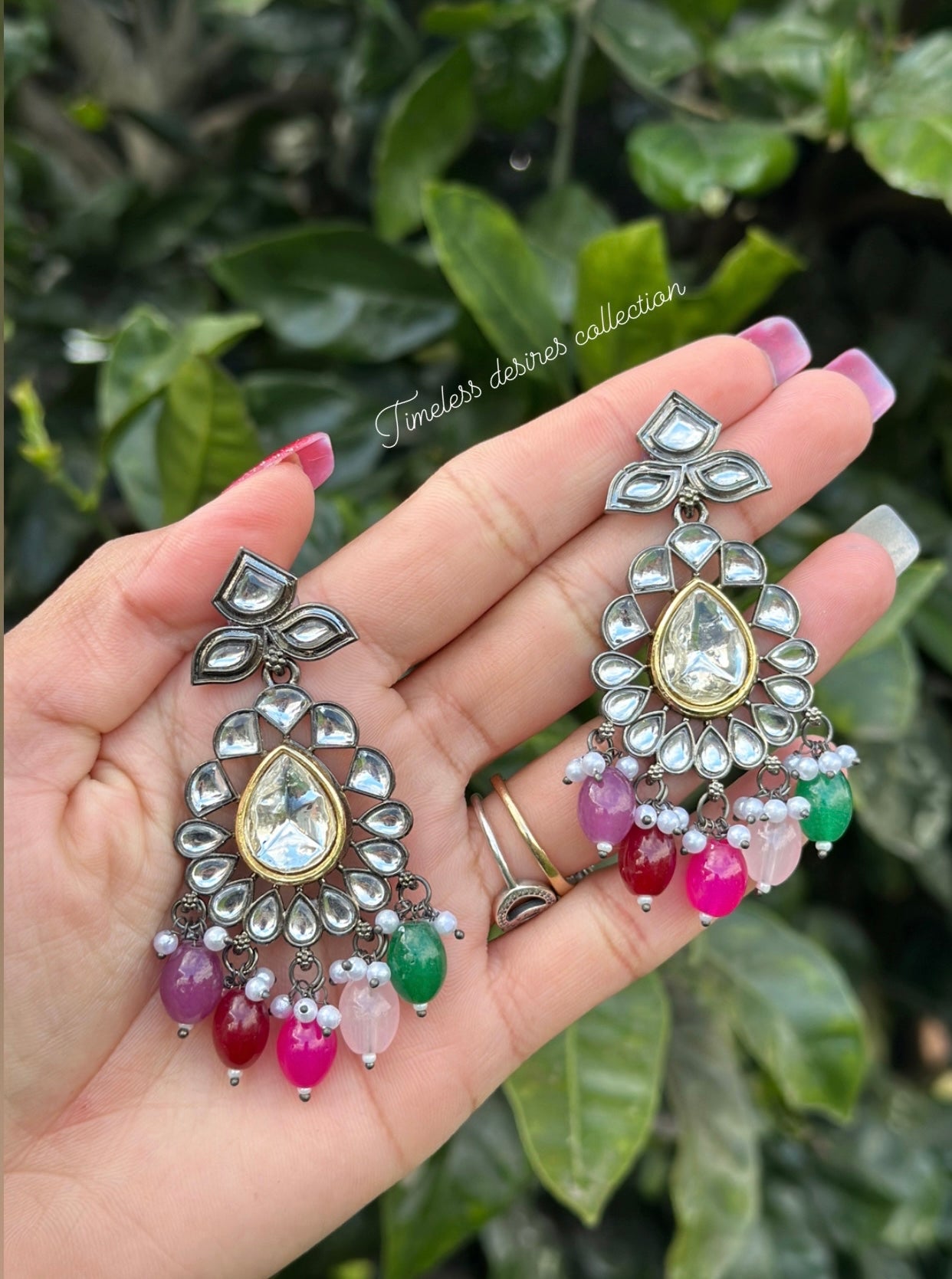 Multi coloured earrings in Kundan