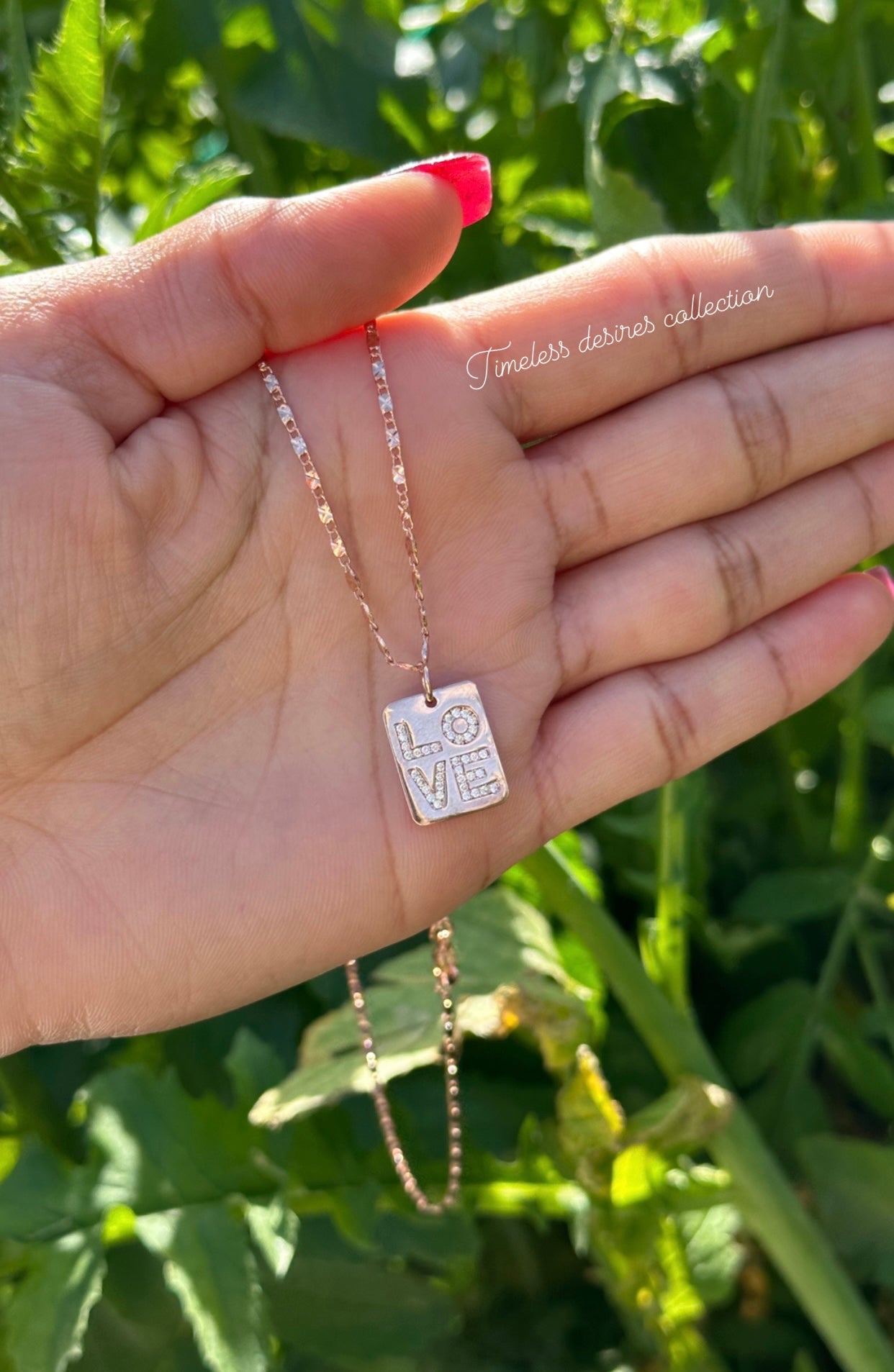 Rose golden necklace in American diamond with “ Love “ pendant