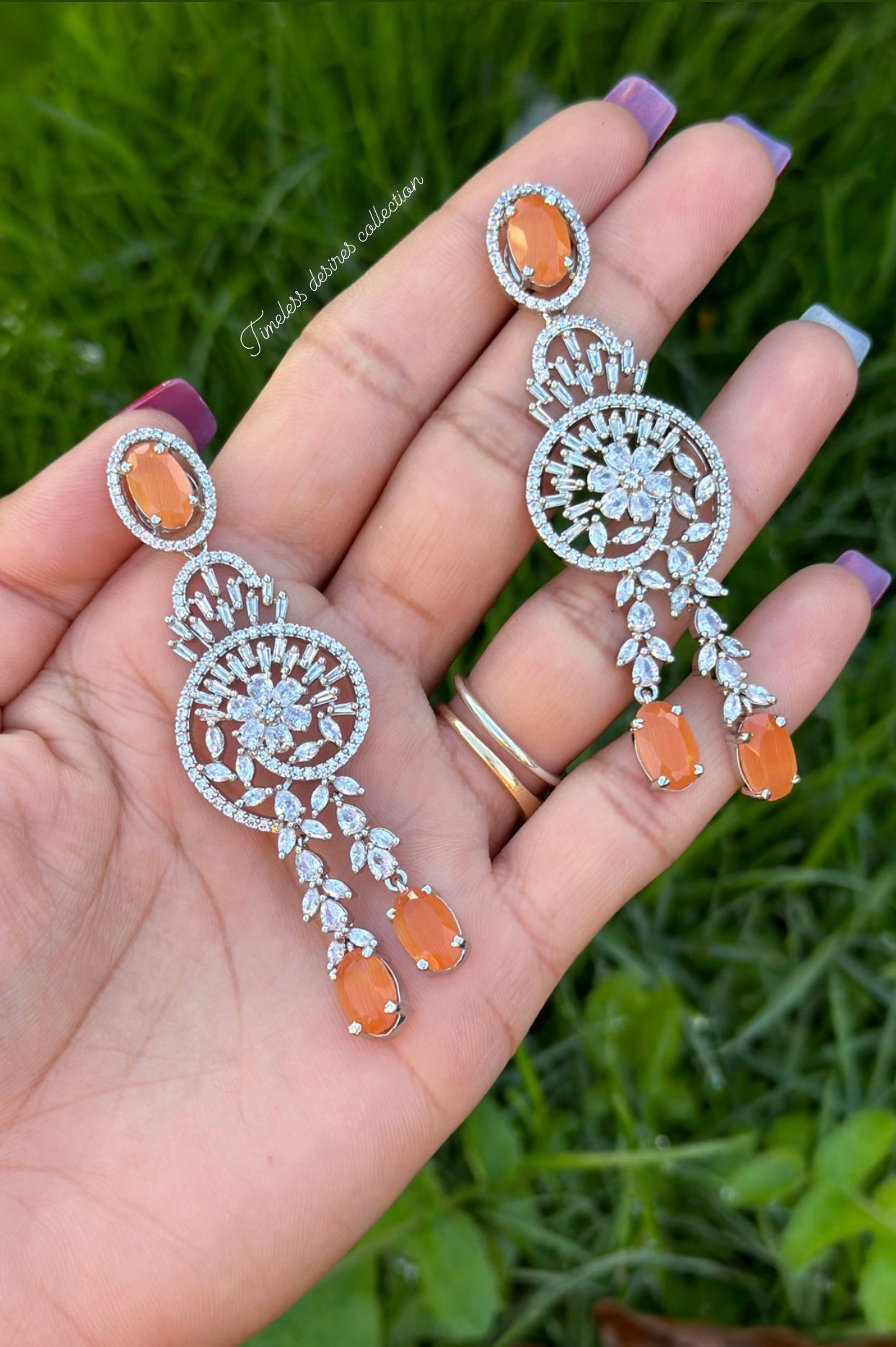 American diamond earrings ( statement PC )