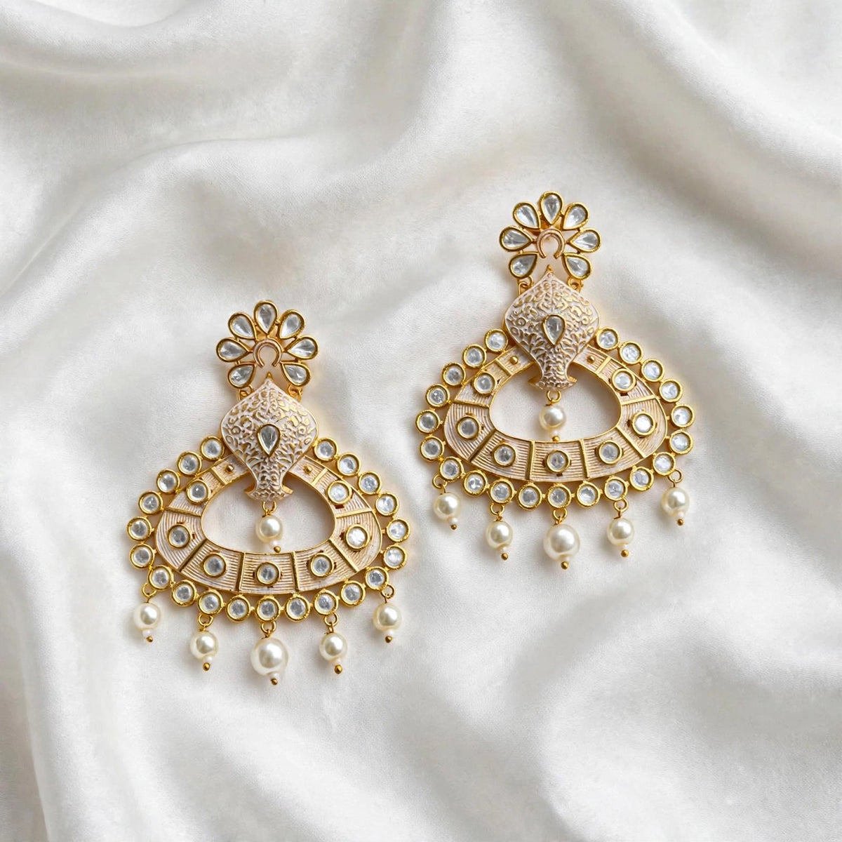 Stunning Tiyani Kundan Gold Plated earrings in peachy golden