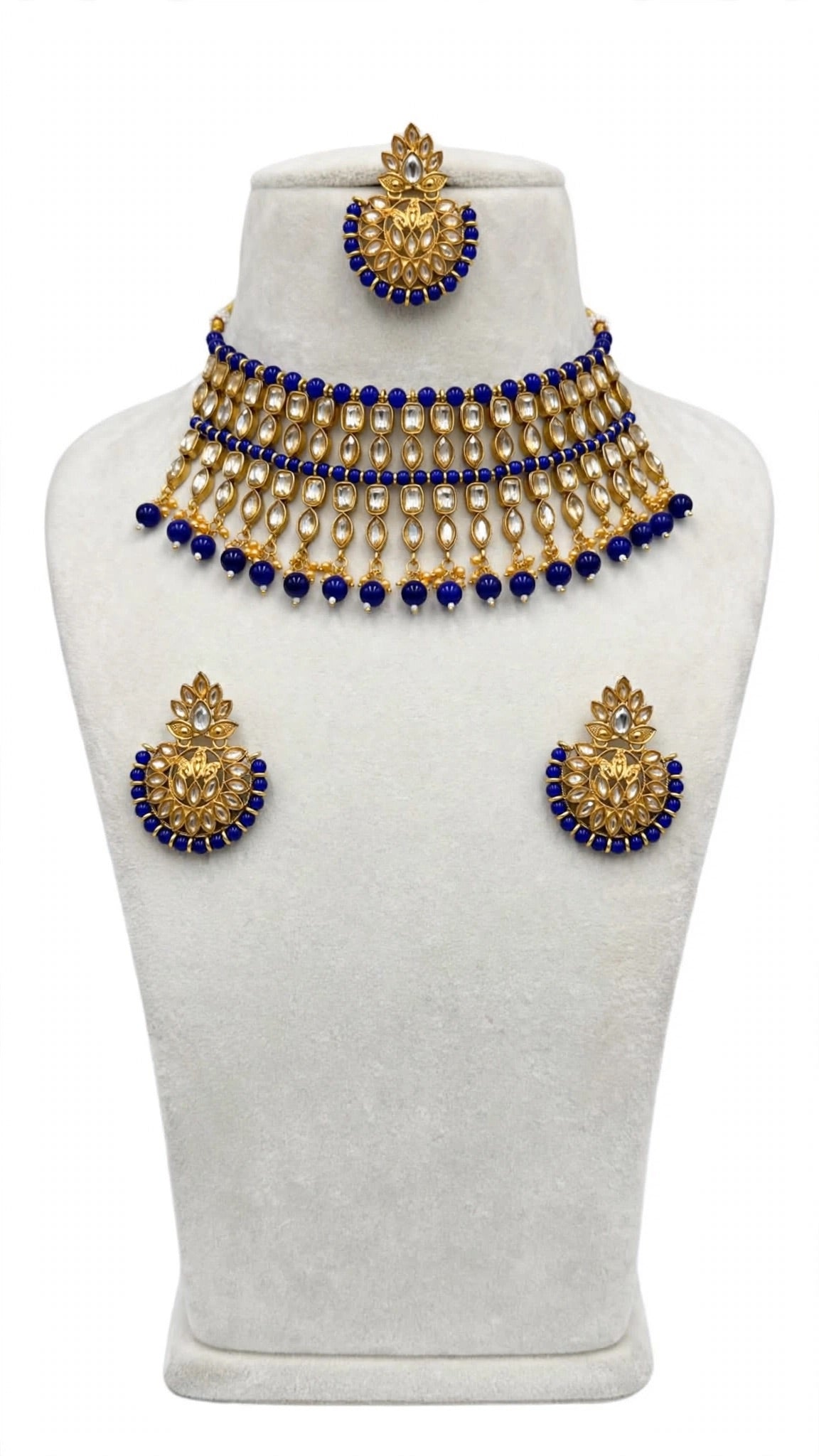 Necklace set with earrings and tikka