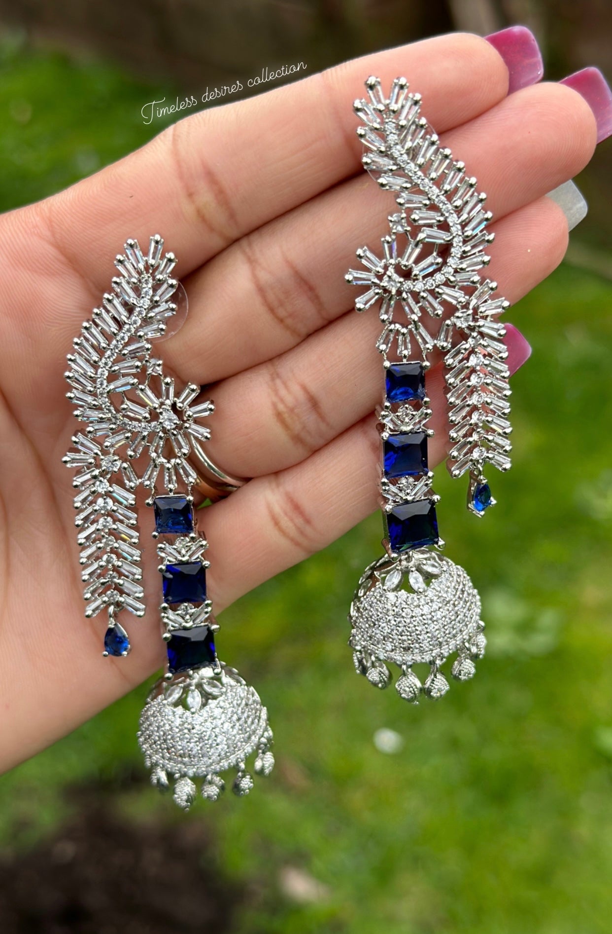 Blue long American diamond Jhumka earrings in silver