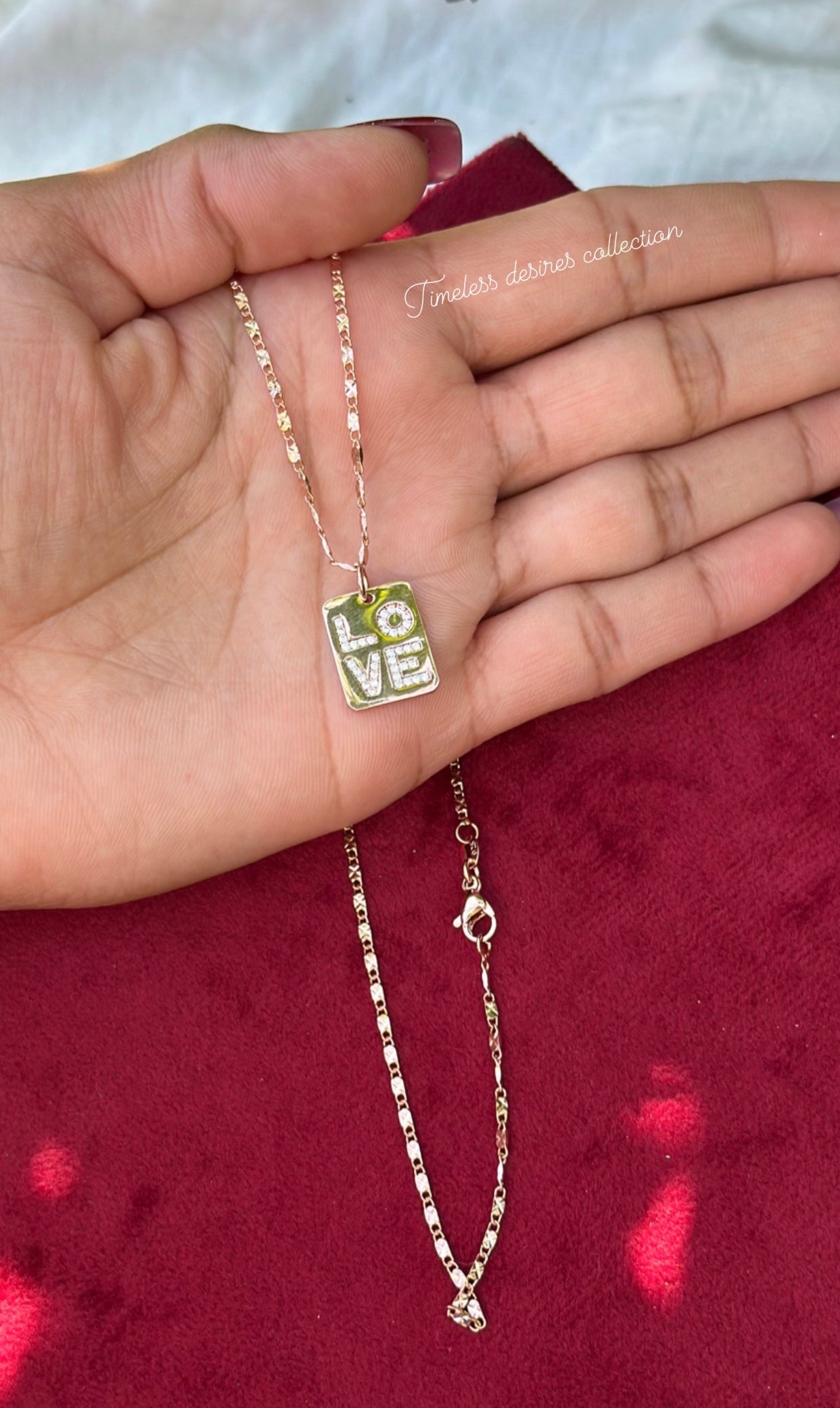 Rose golden necklace in American diamond with “ Love “ pendant