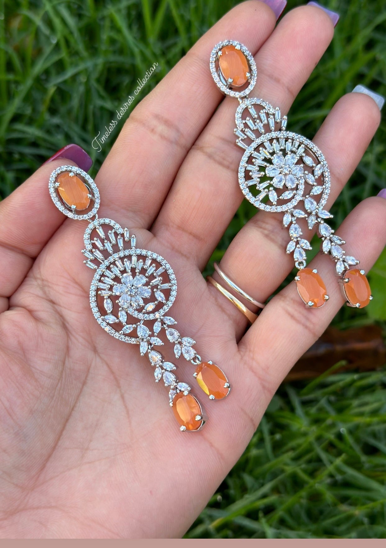 American diamond earrings ( statement PC )