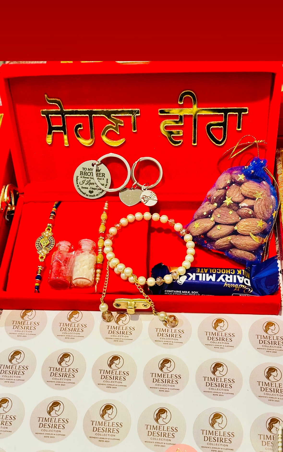 Couple / Veera Bhabi Rakhi gift hamper box - assorted Accessories ( includes - gifts , chocolates , dry fruits and Rakhi’s ) all in one - Code A99
