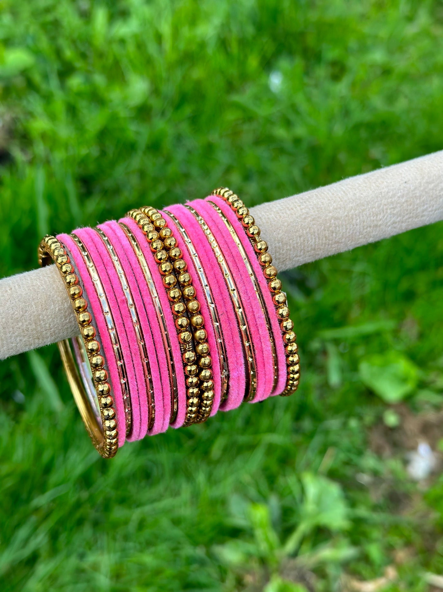 Baby pink velvet bangles set with golden beaded kangan’s
