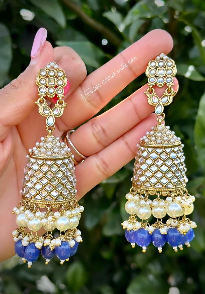 Blue pearl loaded long Jhumka earrings in Kundan