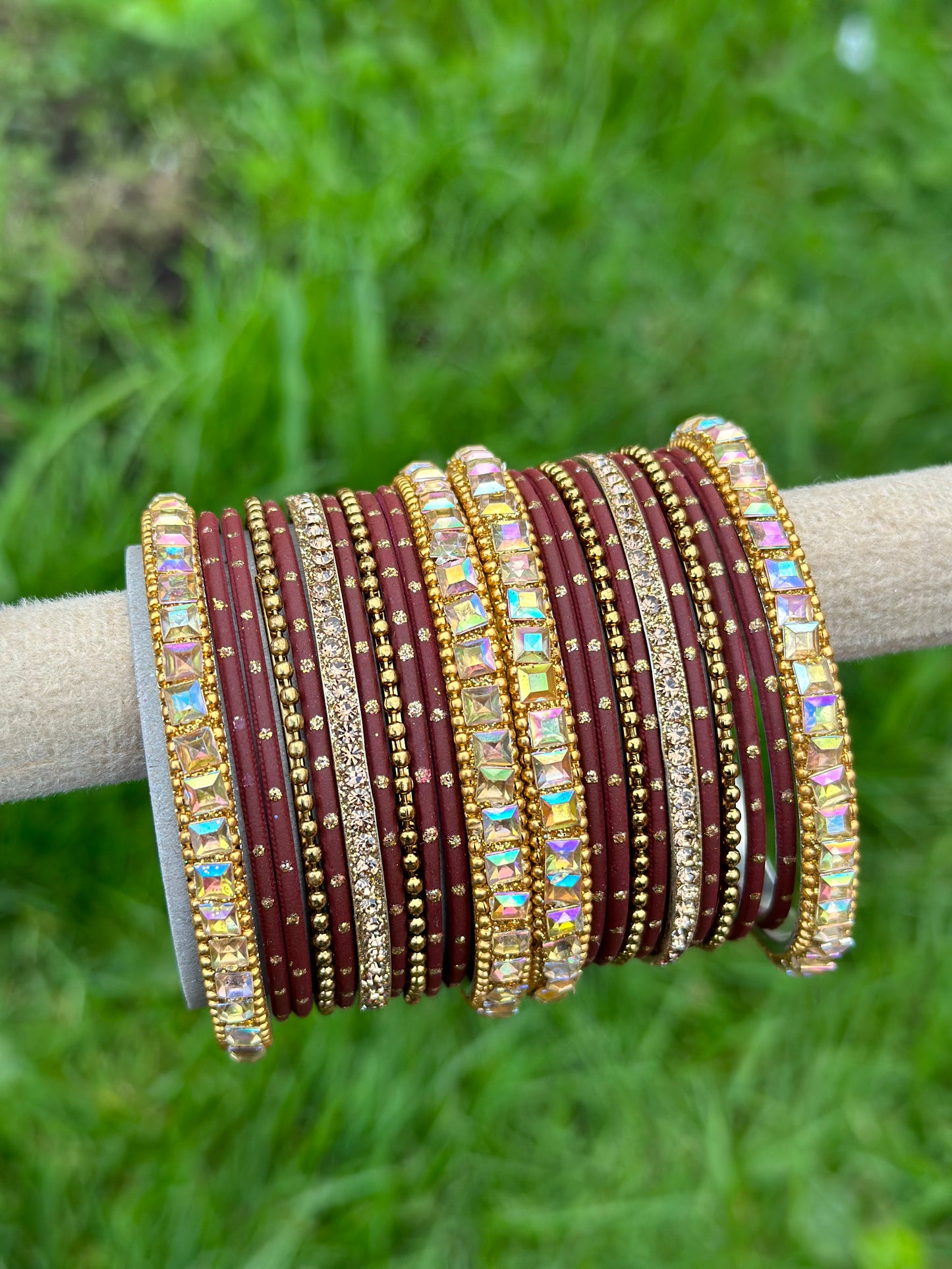 Maroon colour bangles with shiny golden kangan’s ( set of both hands )