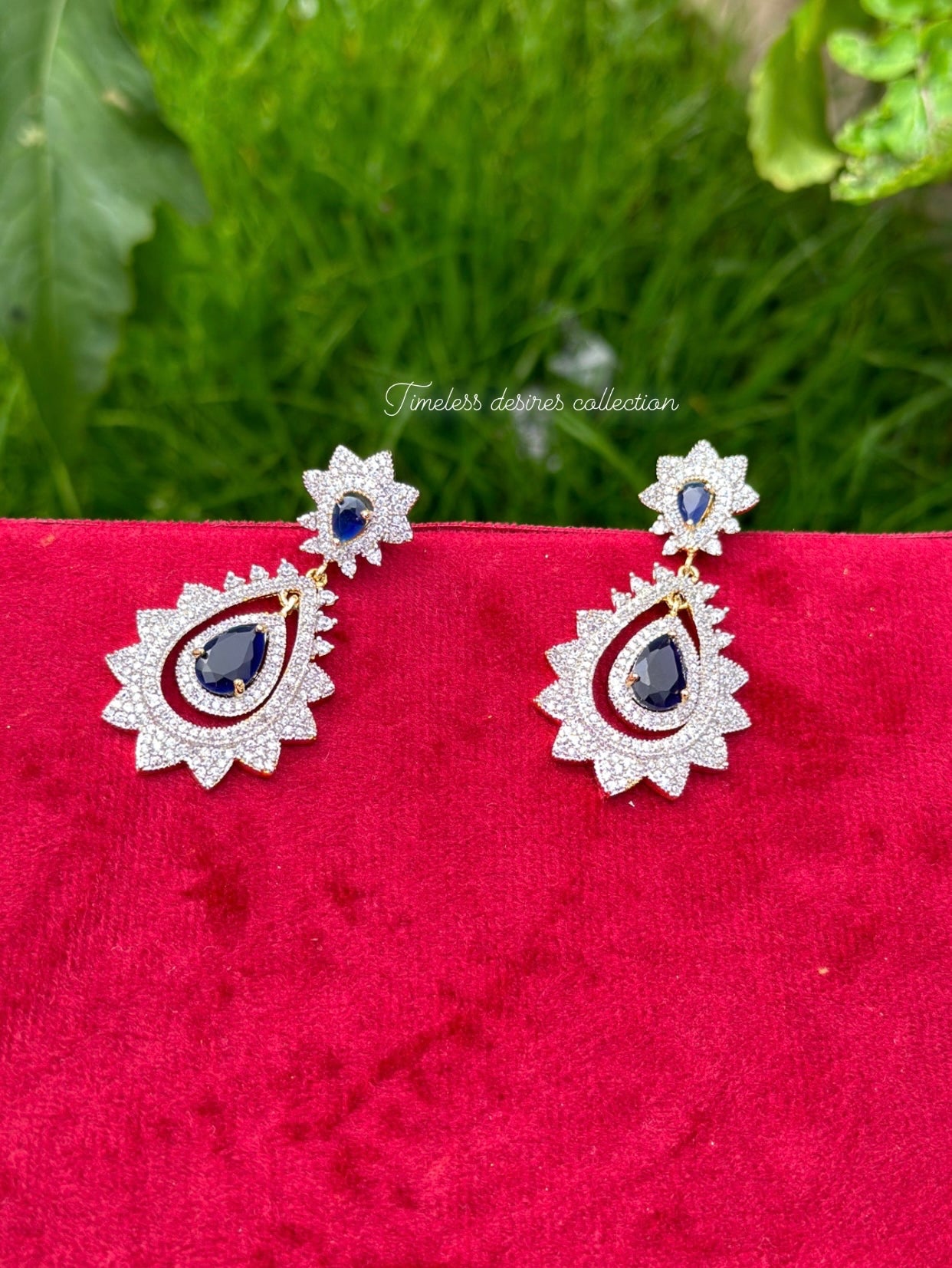 Blue American diamond earrings in golden