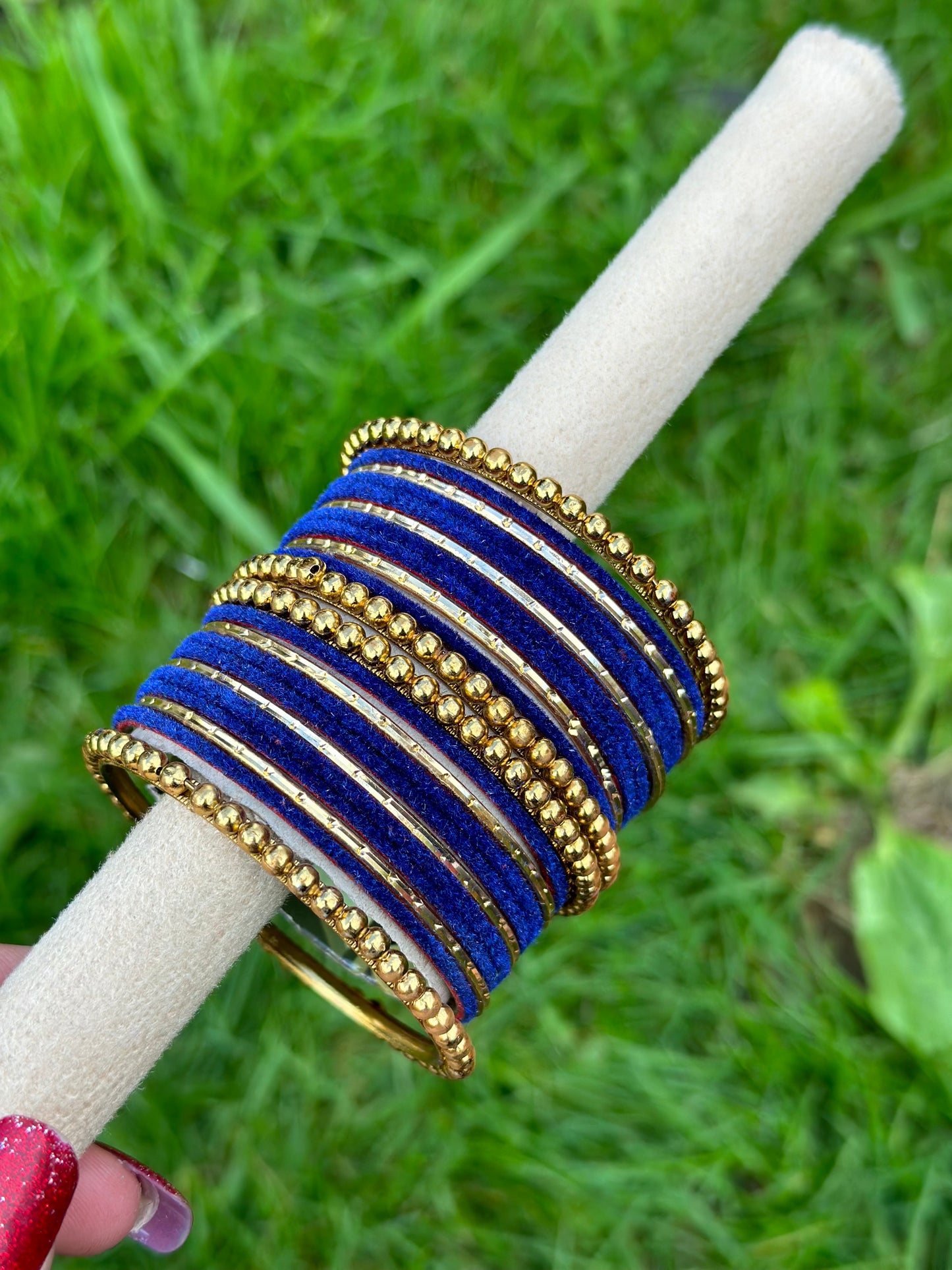 Blue velvet bangles set with golden beaded kangan’s