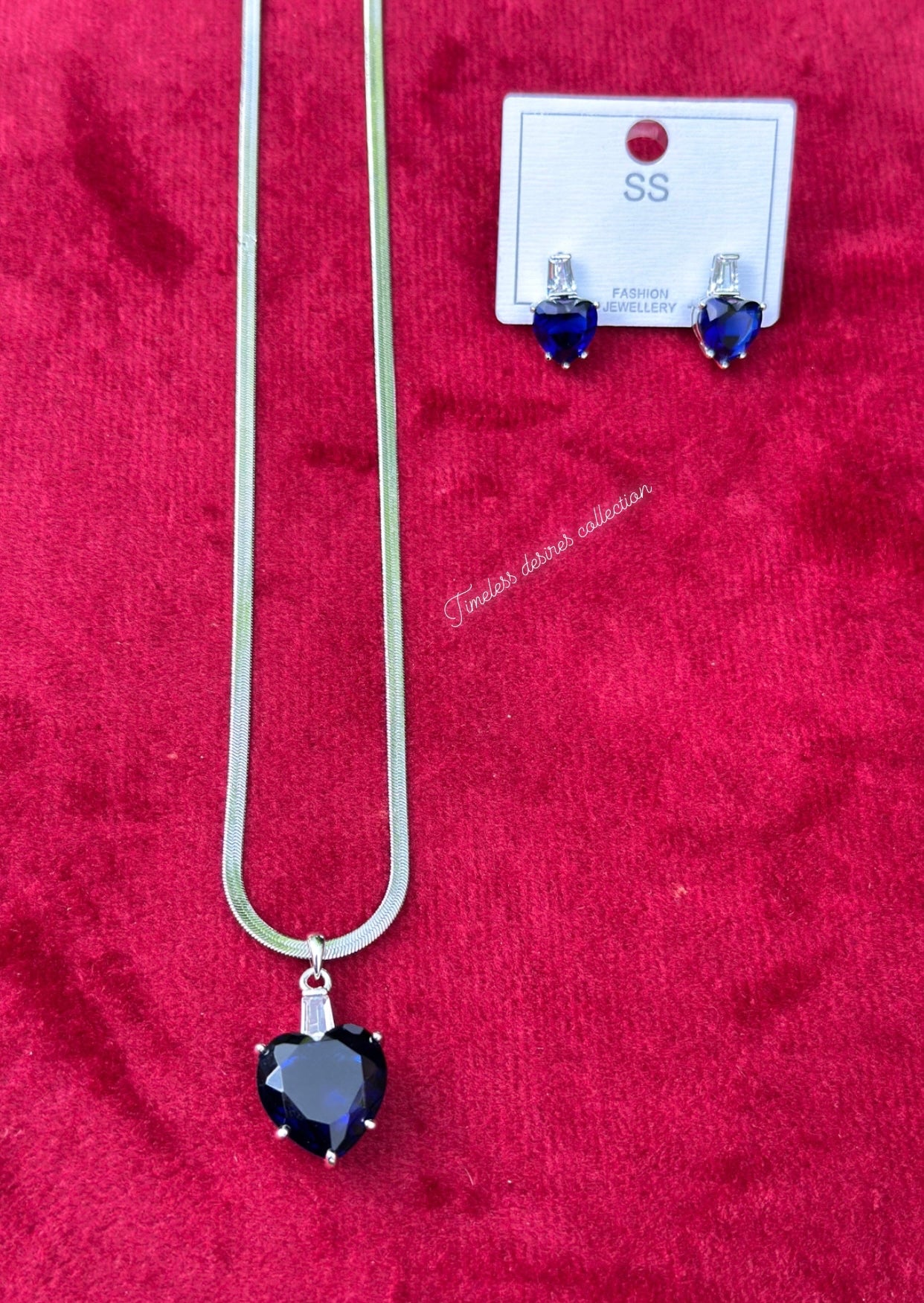 Blue American diamond necklace set with earrings in silver polish