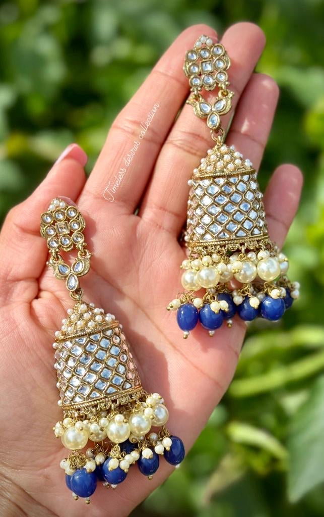 Blue pearl loaded long Jhumka earrings in Kundan