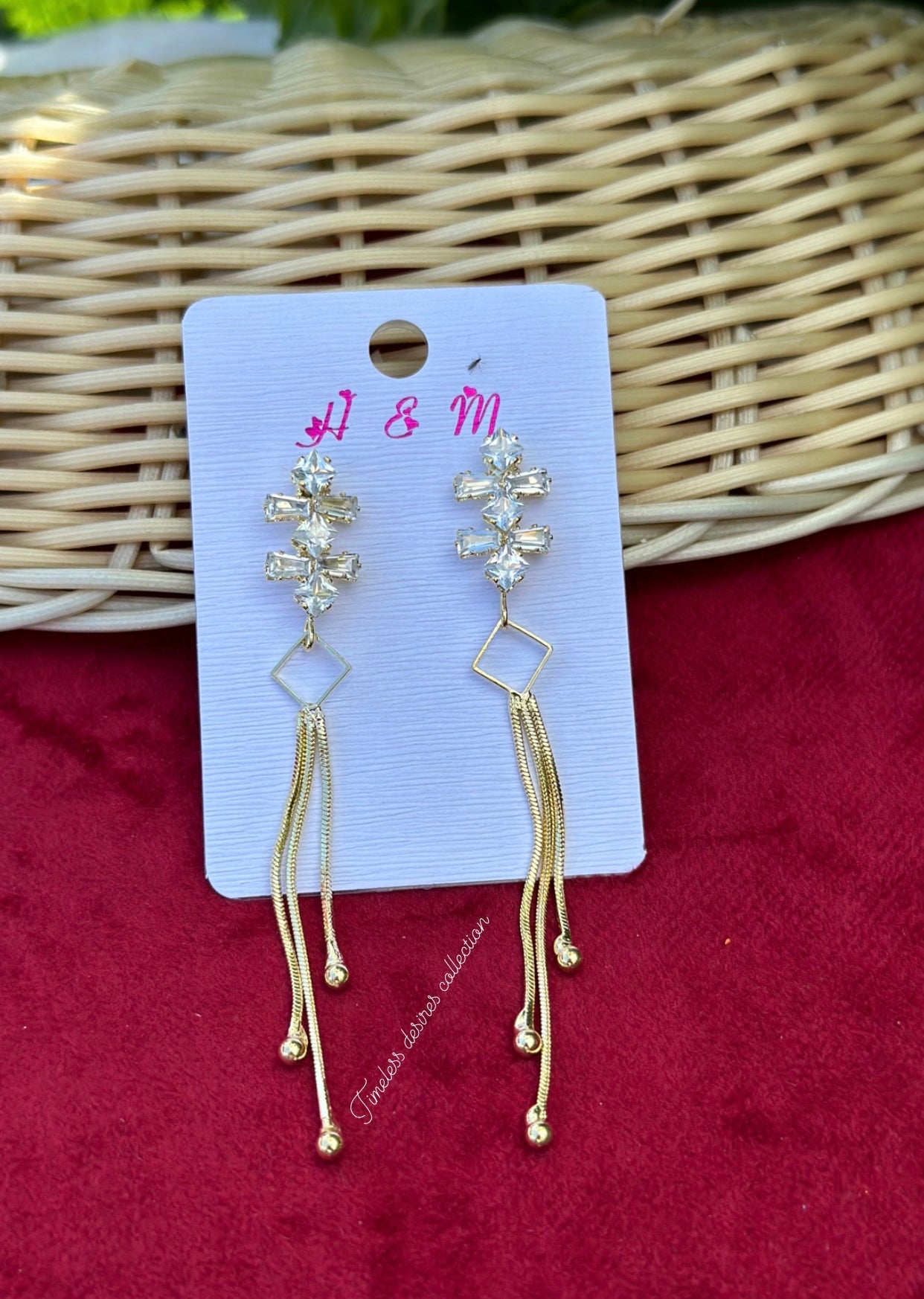 Golden hanging earrings in western style