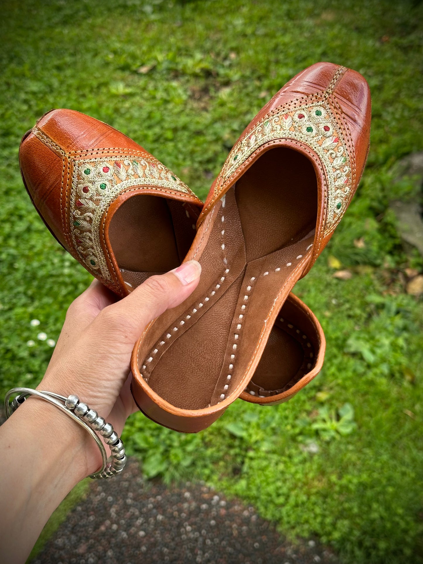 Punjabi jutti in brown colour with work