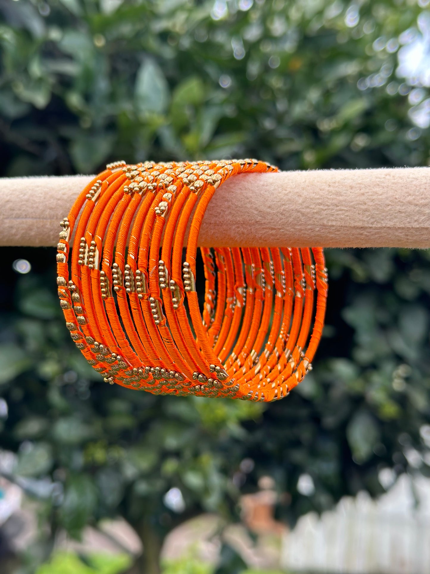 Orange colour thread bangles