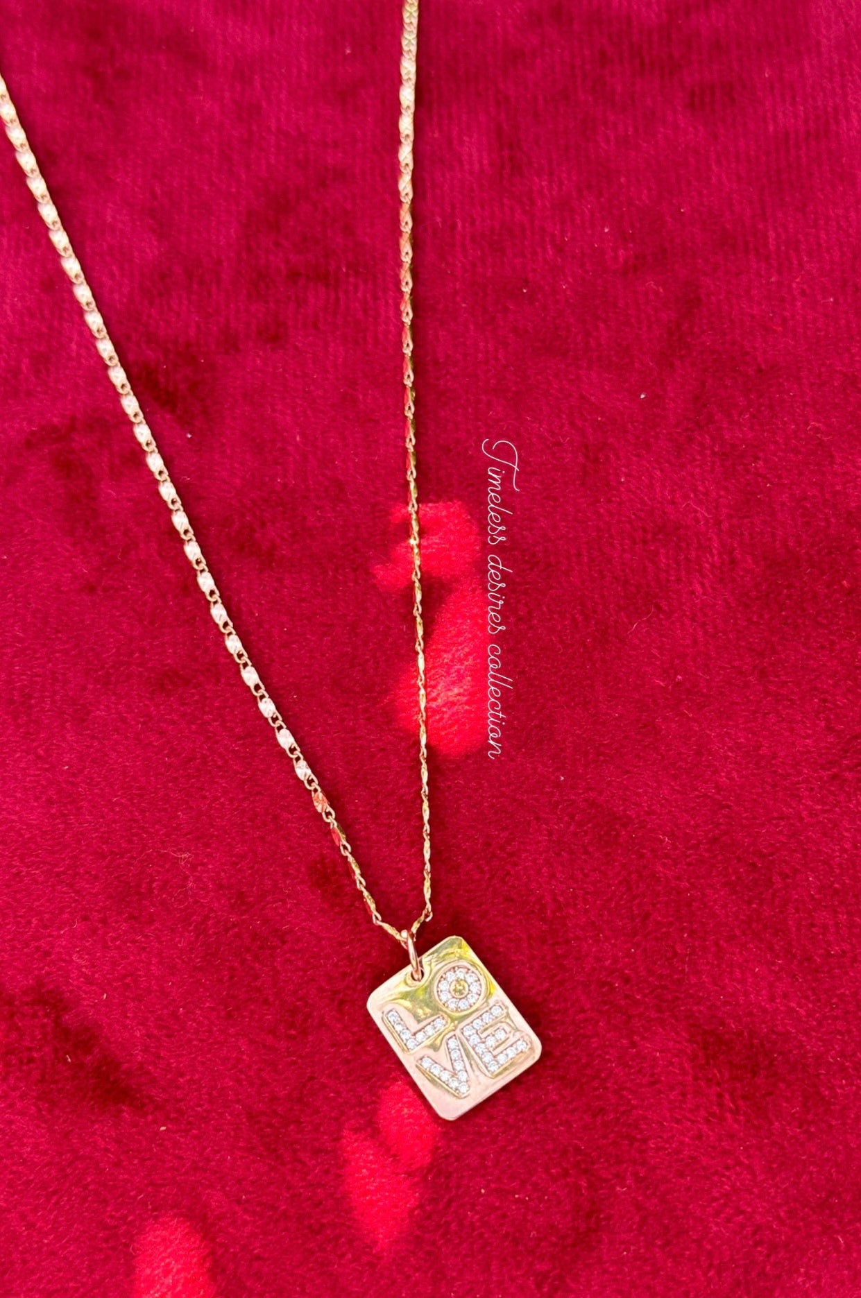 Rose golden necklace in American diamond with “ Love “ pendant