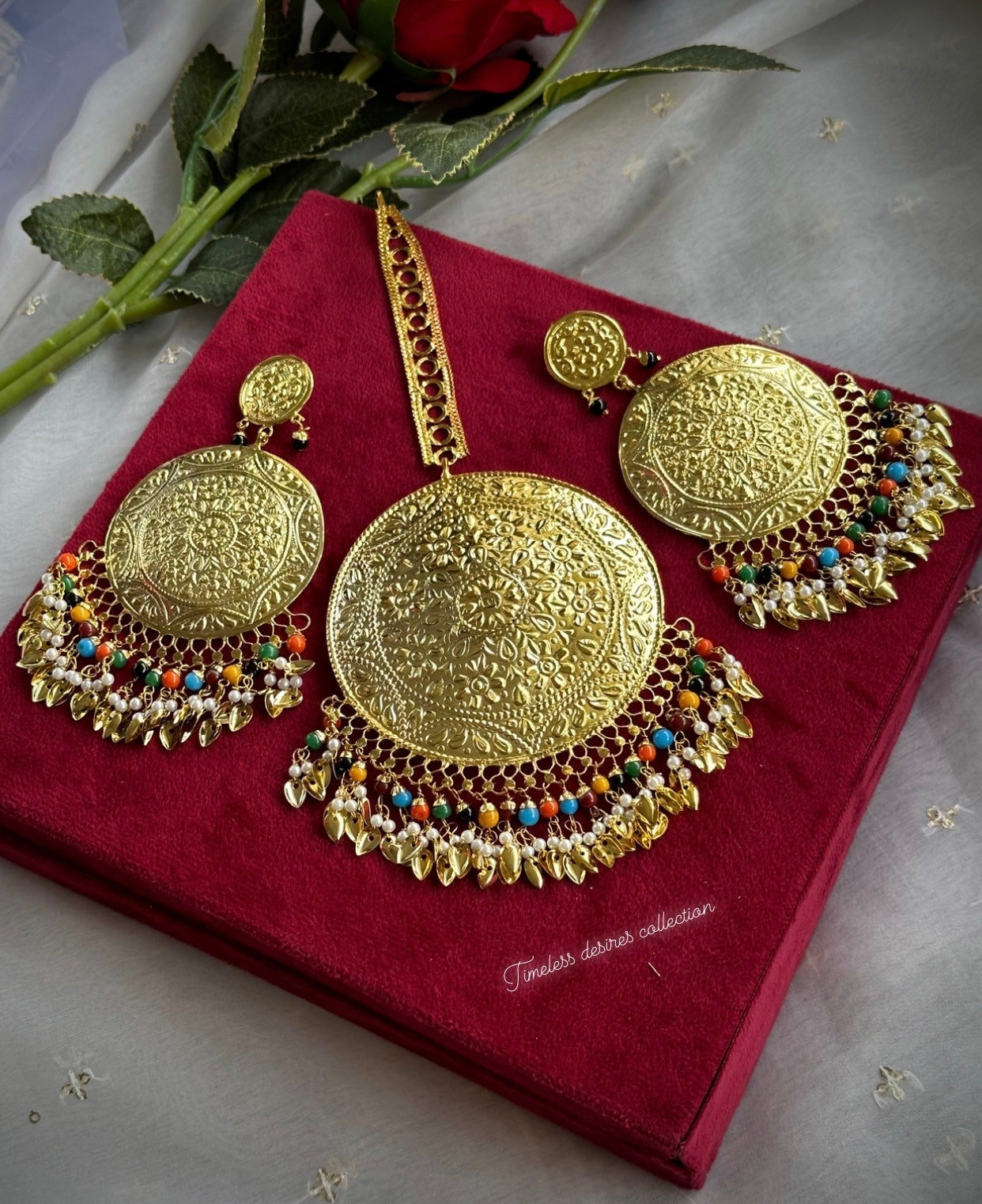 Multi coloured oversized earrings and tikka set in Punjabi traditional jewellery
