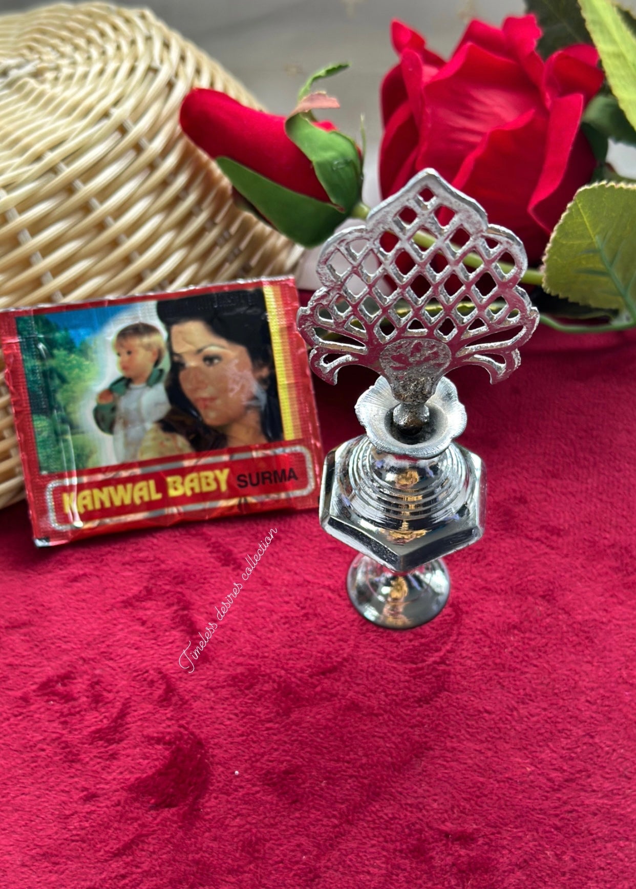 Traditional surmadani with a pack of fresh Surma filling
