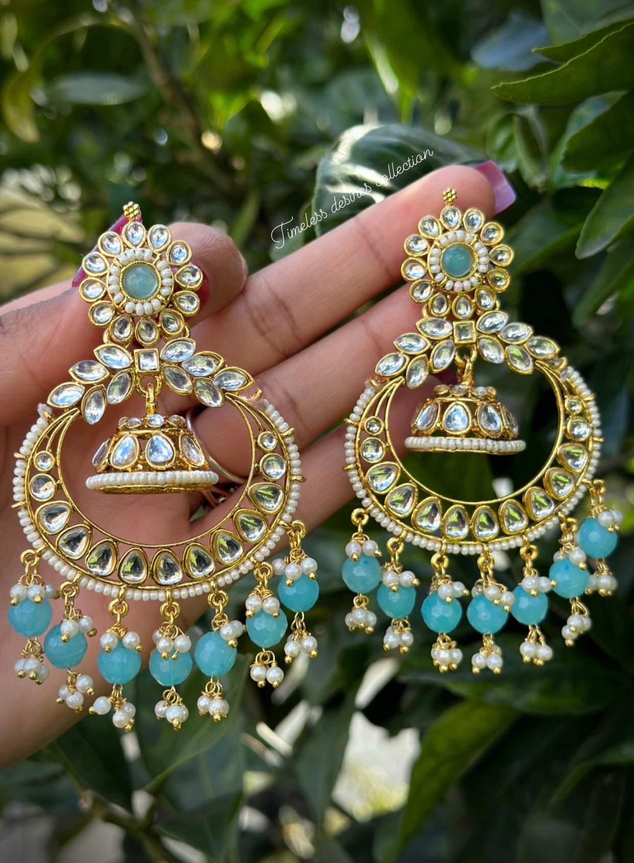 Sky blue Jhumka drop earrings in Kundan