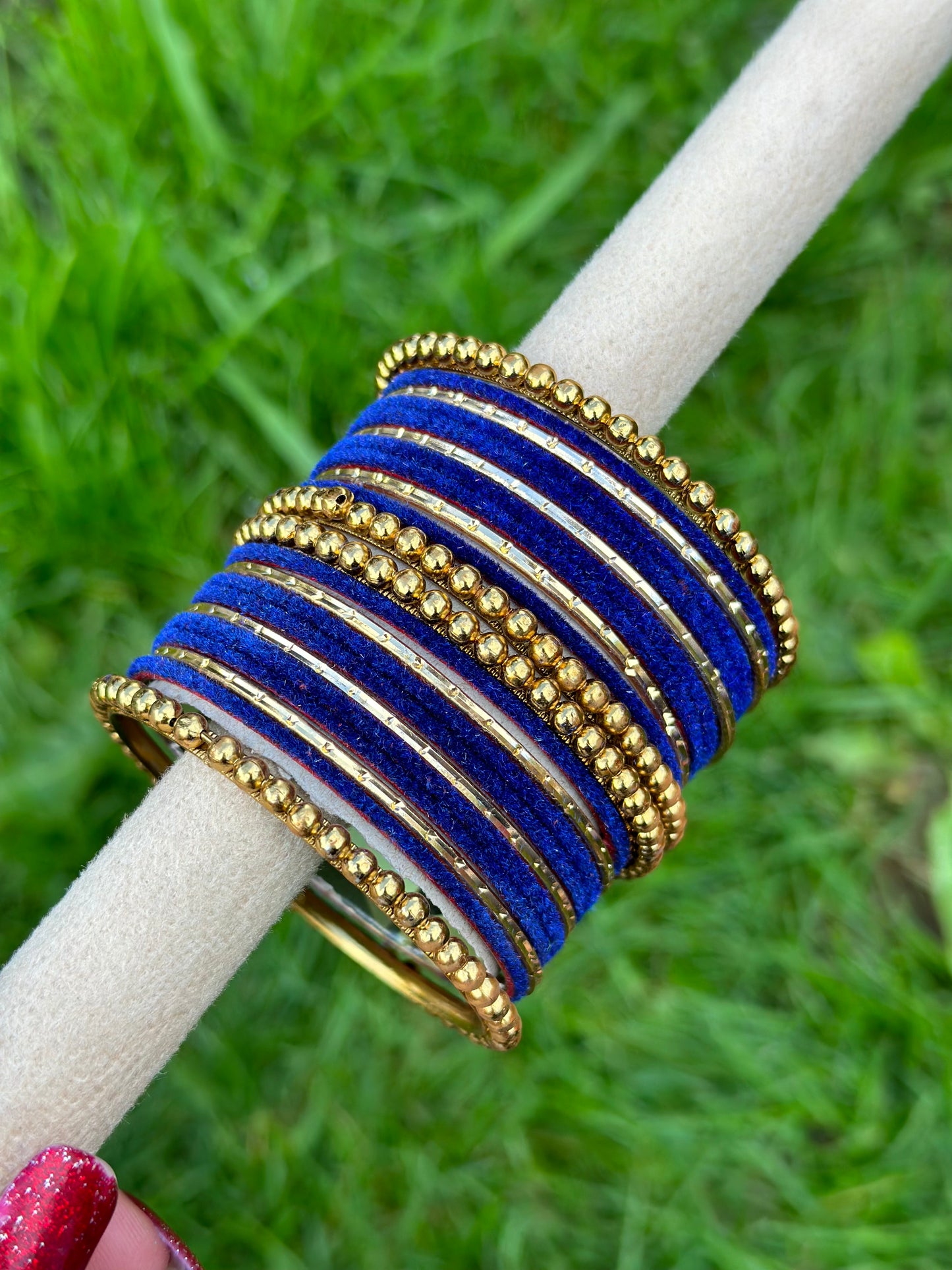 Blue velvet bangles set with golden beaded kangan’s