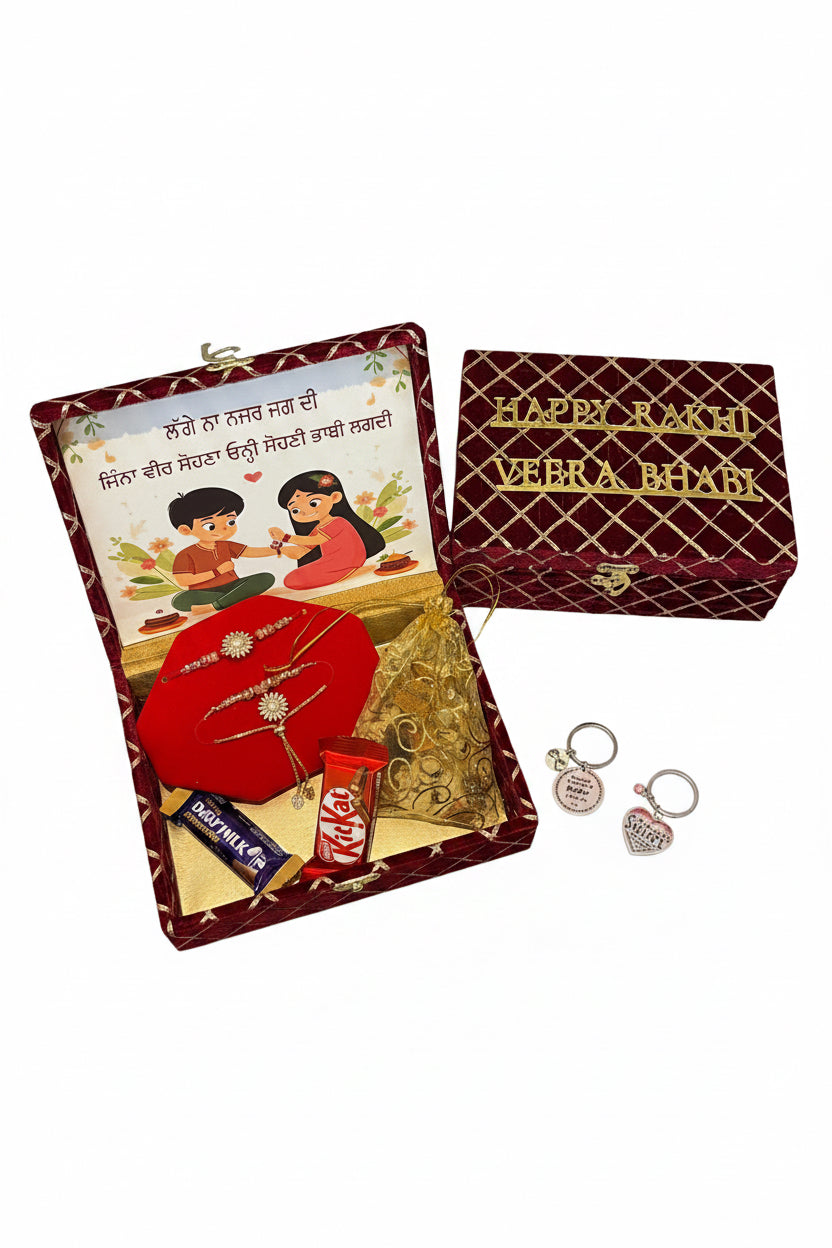 Premium veera bhabi rakhi hamper box - Includes customsied hamper box , American diamond couple rakhi set , Mixed Nuts , Chocolates , As gift key chain set for couple