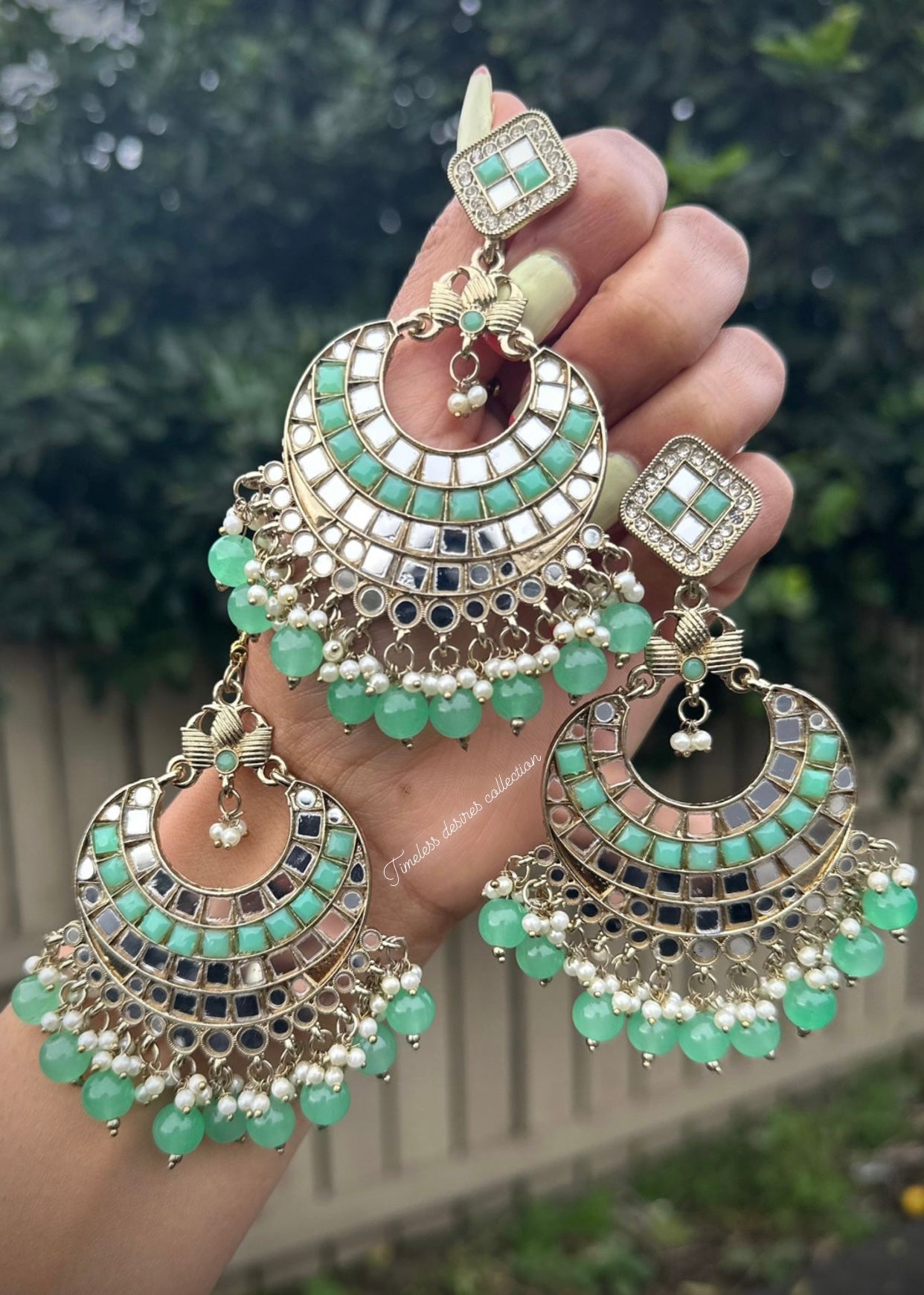Mint green earrings and tikka set in mirror