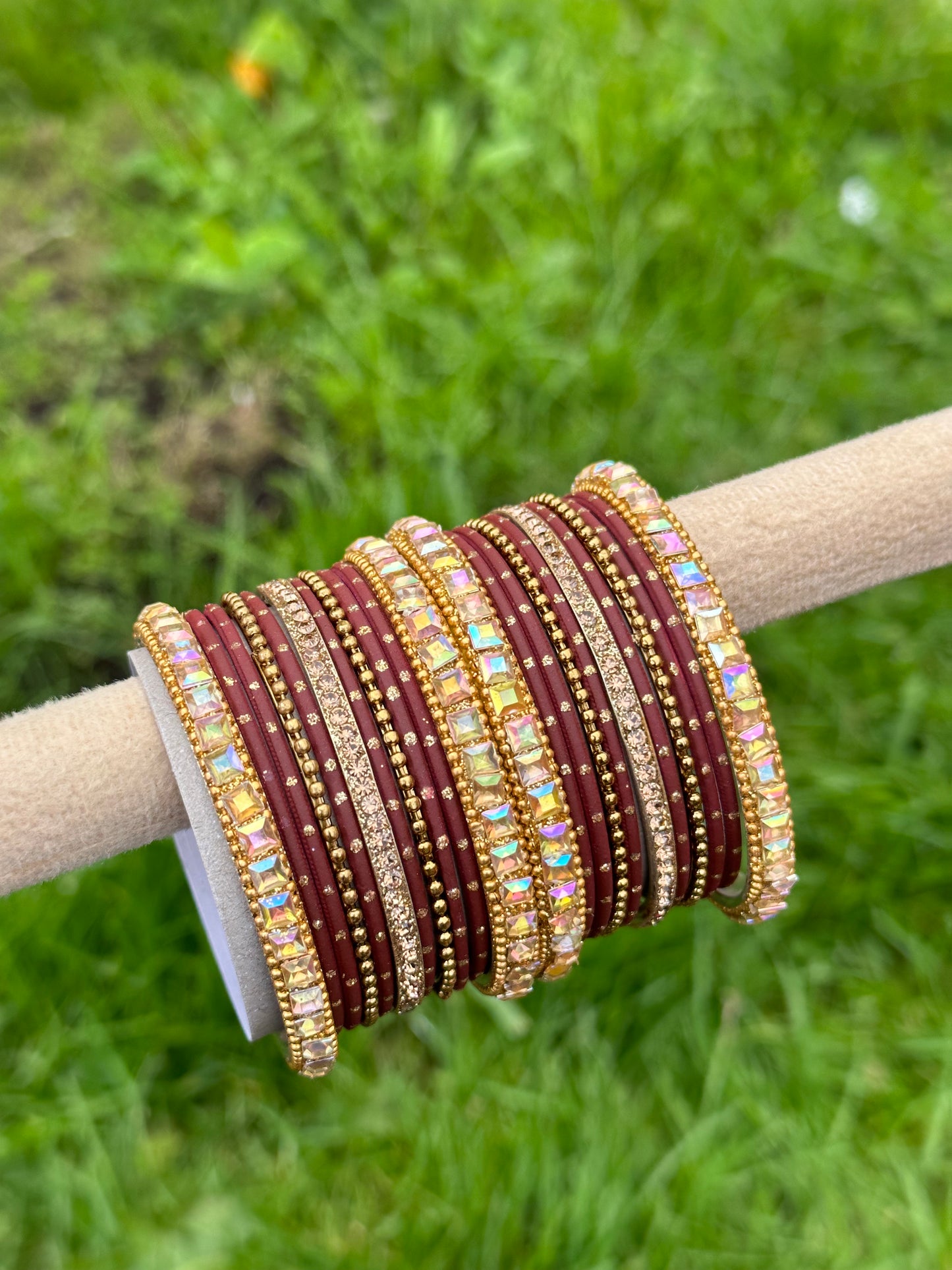 Maroon colour bangles with shiny golden kangan’s ( set of both hands )
