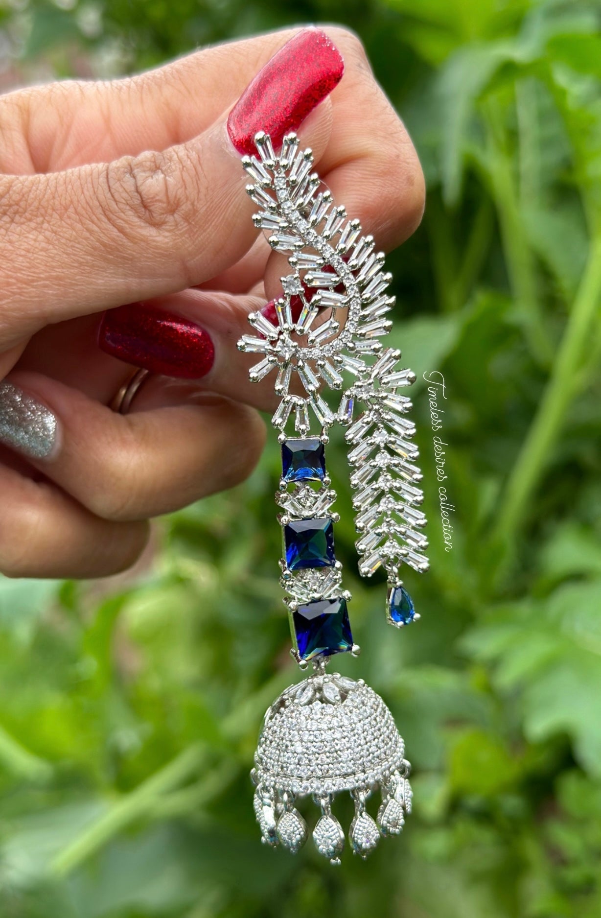 Blue long American diamond Jhumka earrings in silver