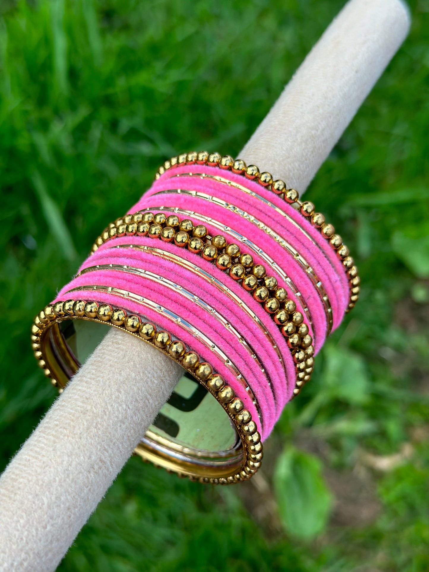 Baby pink velvet bangles set with golden beaded kangan’s