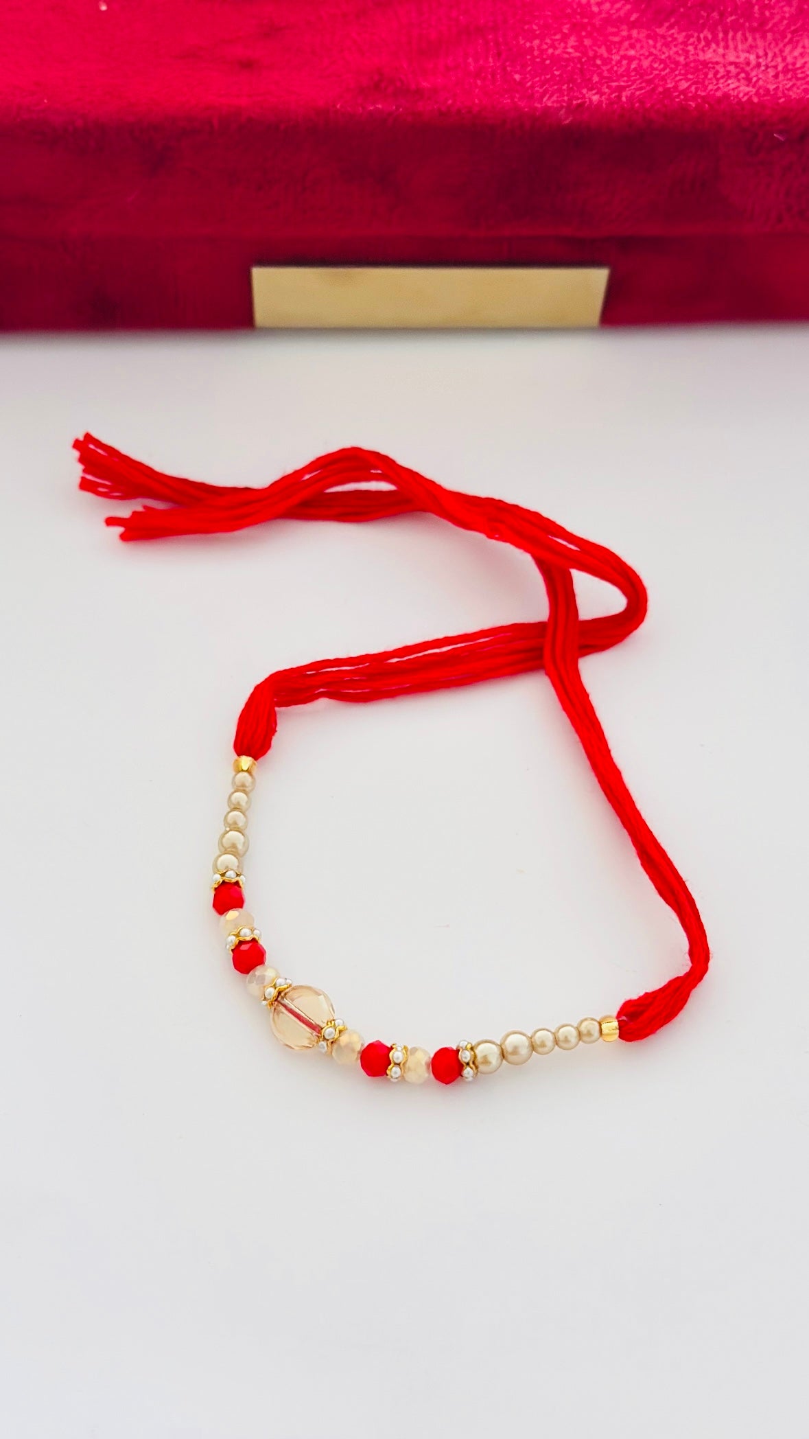 Pearl loaded Red & Gold Rakhi thread ( Per PC )- Code A51