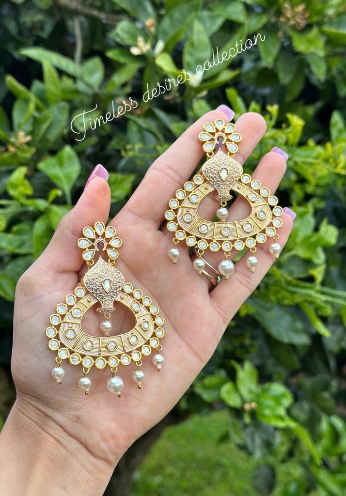 Stunning Tiyani Kundan Gold Plated earrings in peachy golden