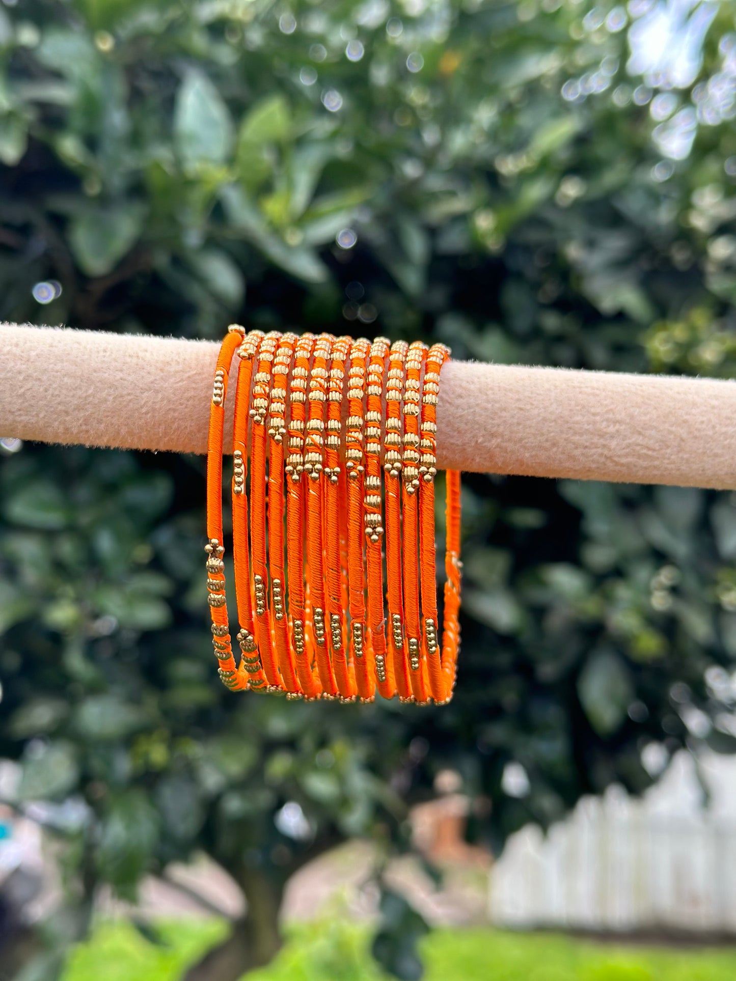 Orange colour thread bangles