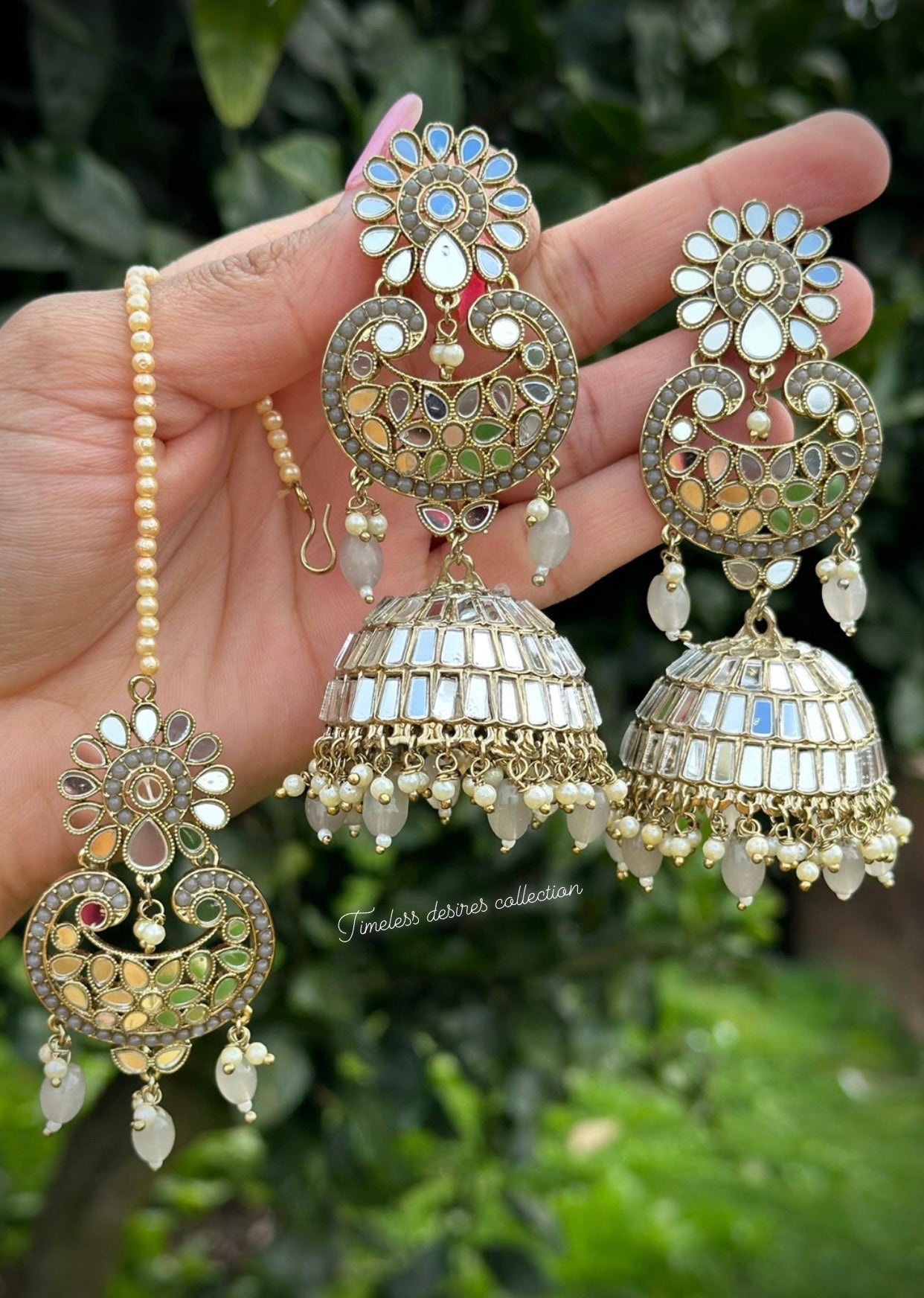 Grey long earnings and tikka set in mirror