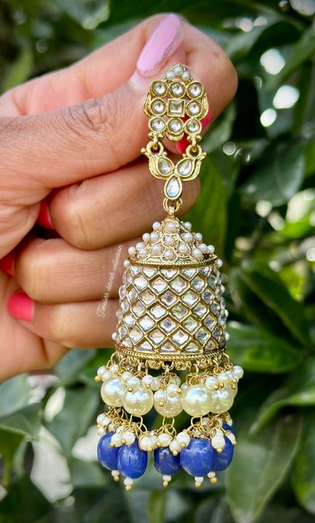 Blue pearl loaded long Jhumka earrings in Kundan