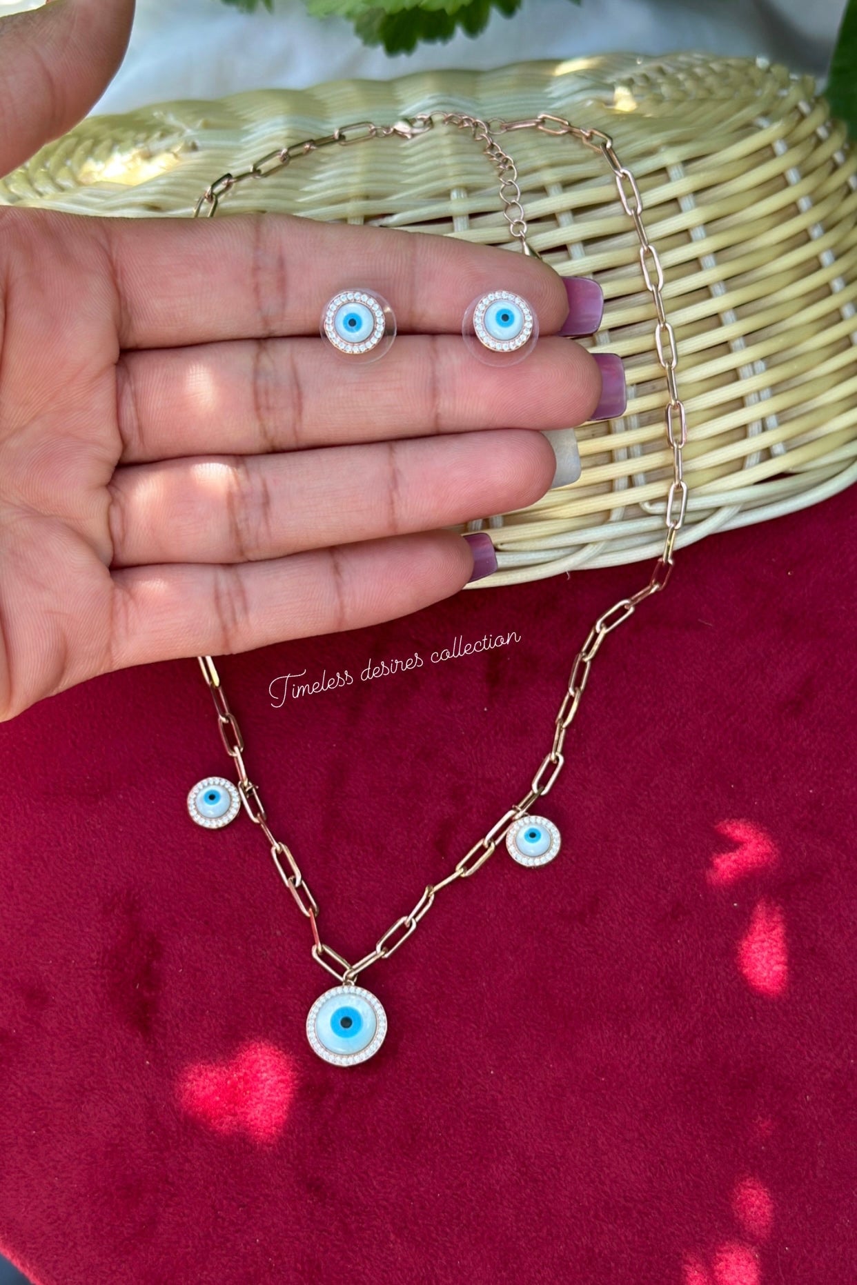 Evil eye necklace set with studs in American diamond high quality rose gold colour
