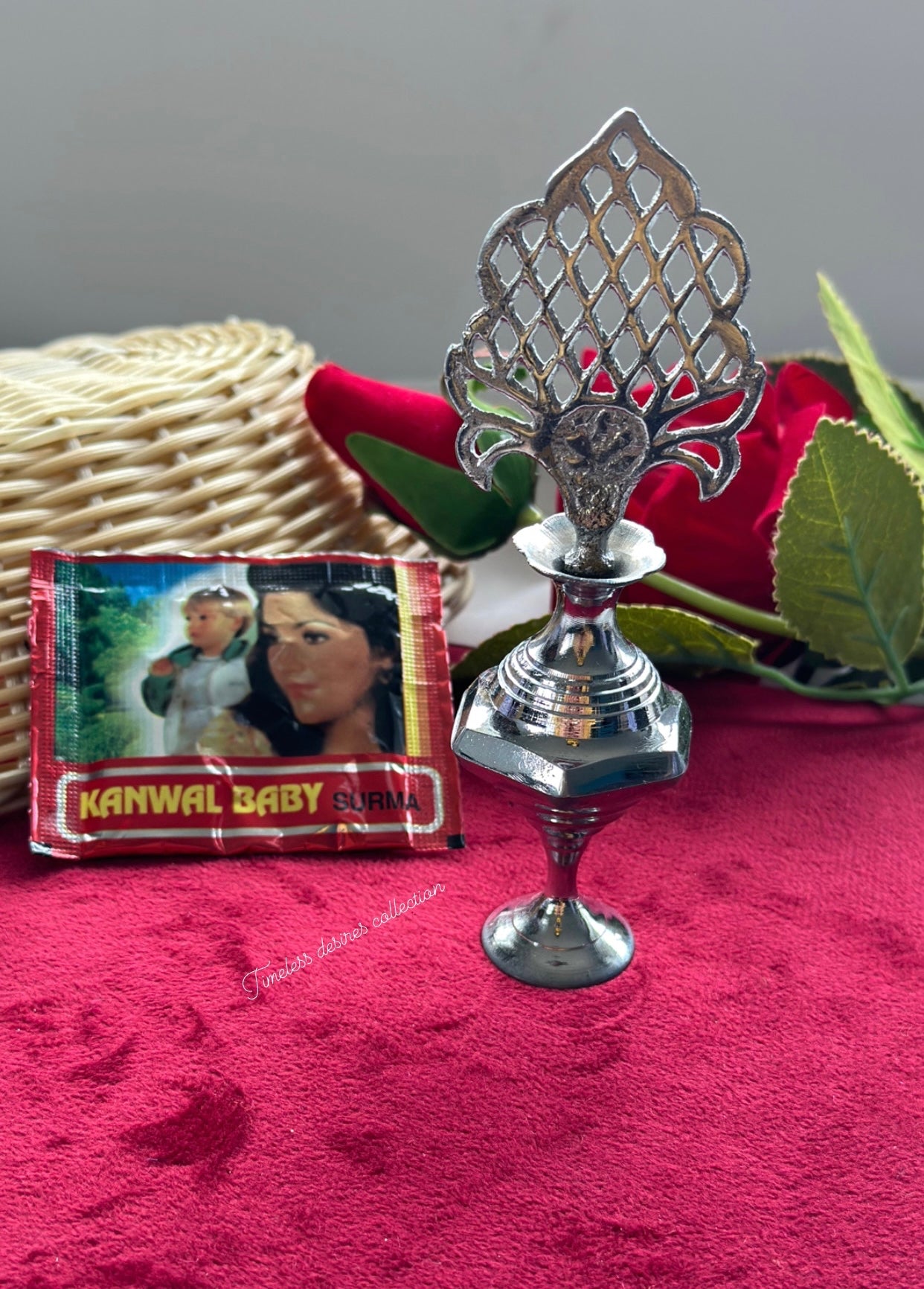 Traditional surmadani with a pack of fresh Surma filling