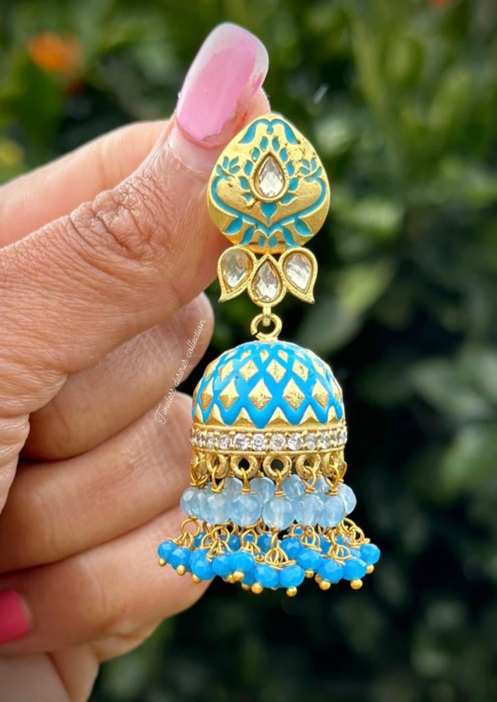 Sky blue Jhumka earrings in Meenakari with gold plating