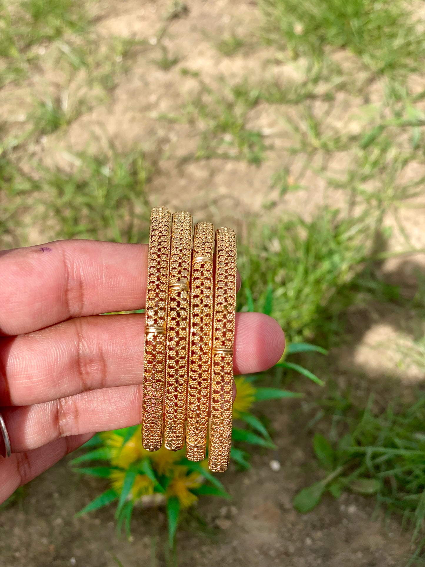 Golden bangles (set of 4) B1