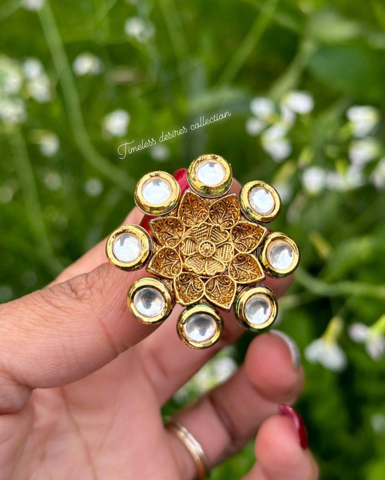 Golden ring in Kundan with antique look flower ( adjustable size )