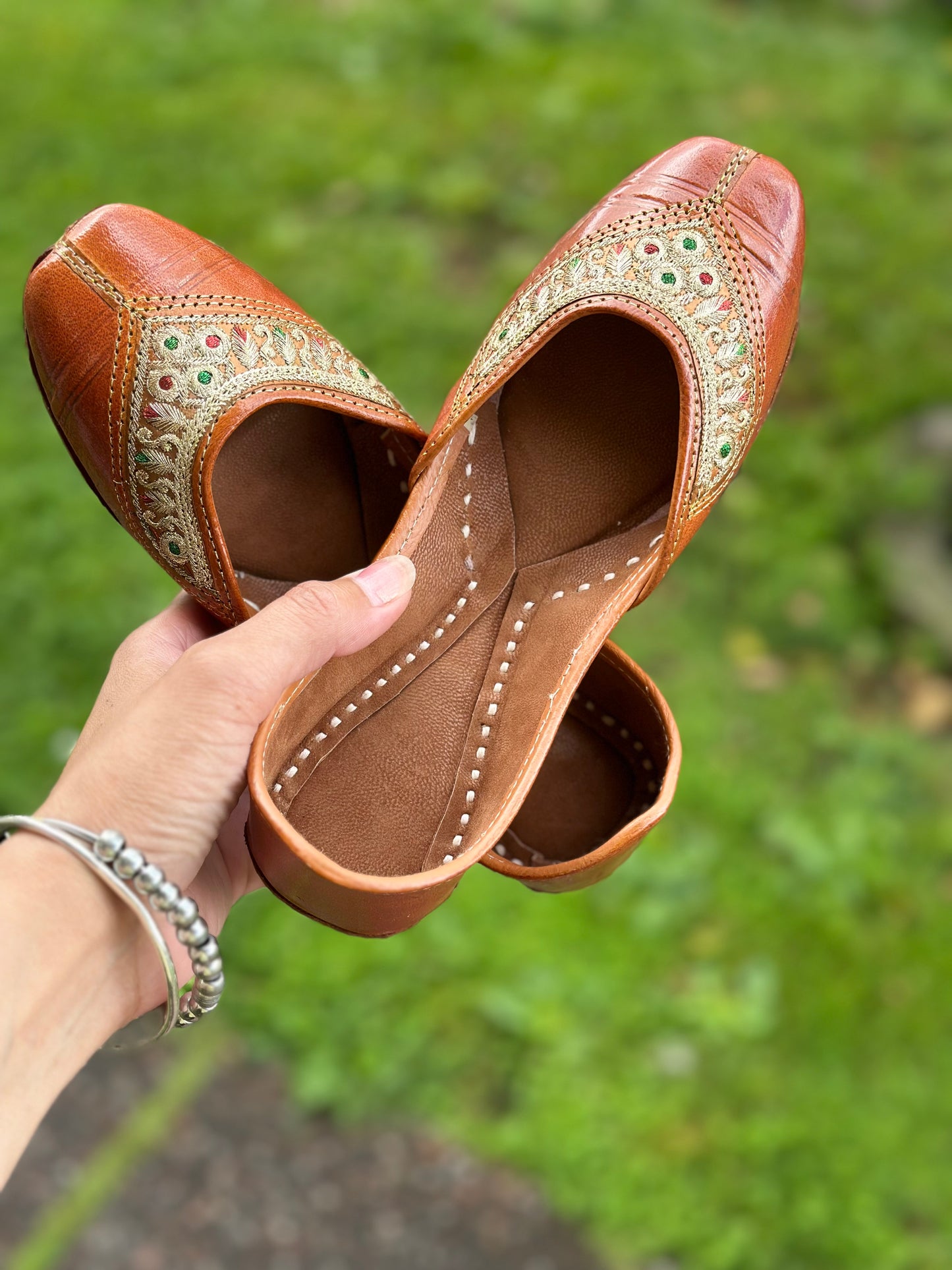 Punjabi jutti in brown colour with work