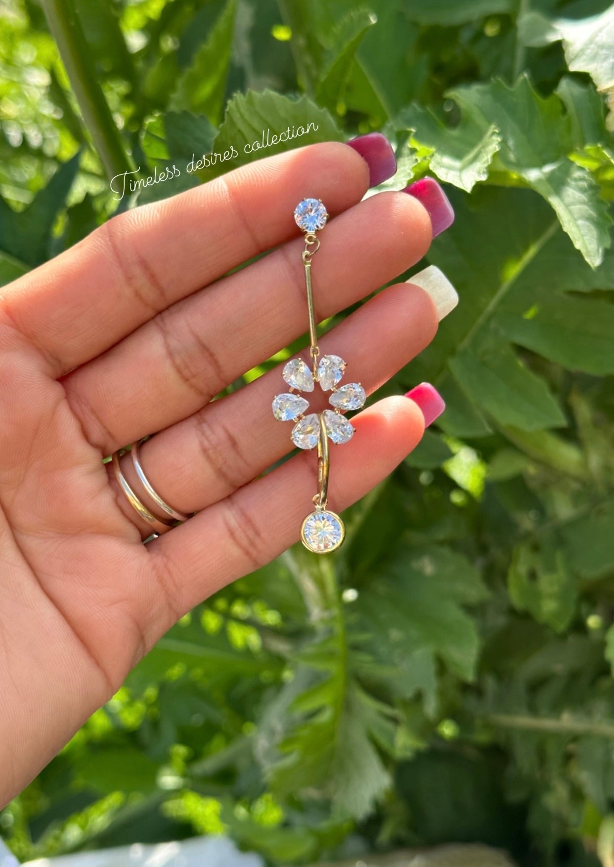 Golden hanging earrings in western style