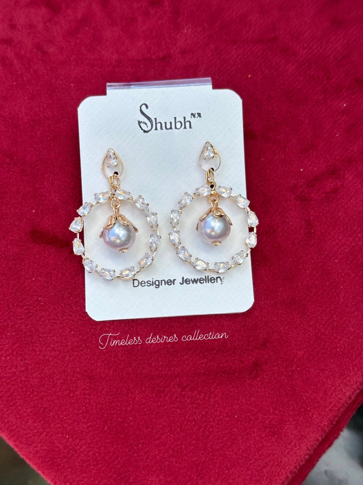 Pearl drop golden earrings in western style