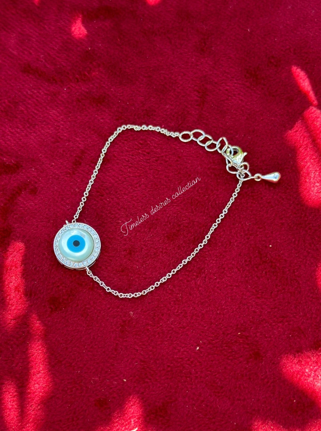 Evil eye adjustable size bracelet in American diamond on silver polish