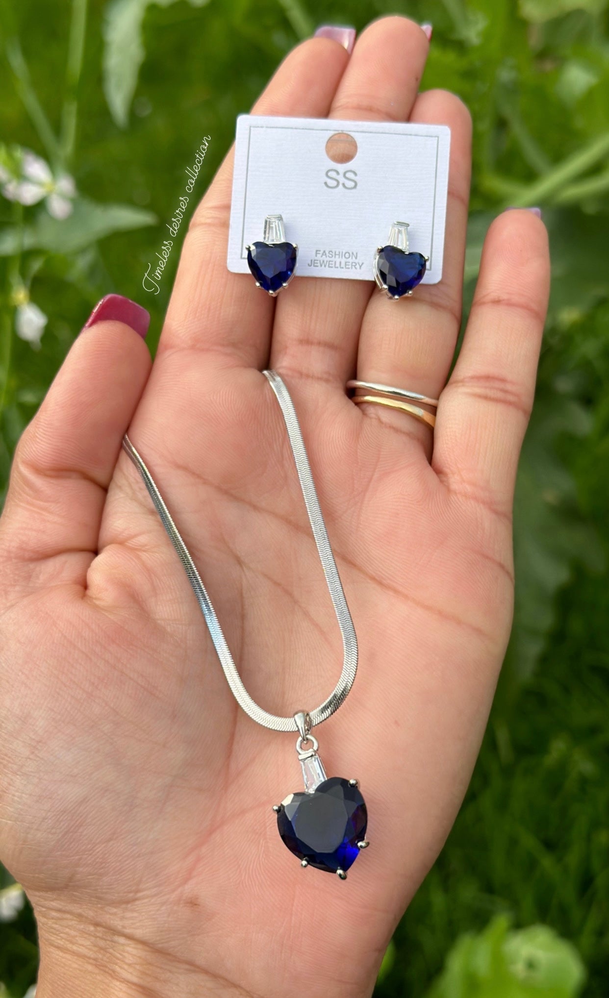Blue American diamond necklace set with earrings in silver polish
