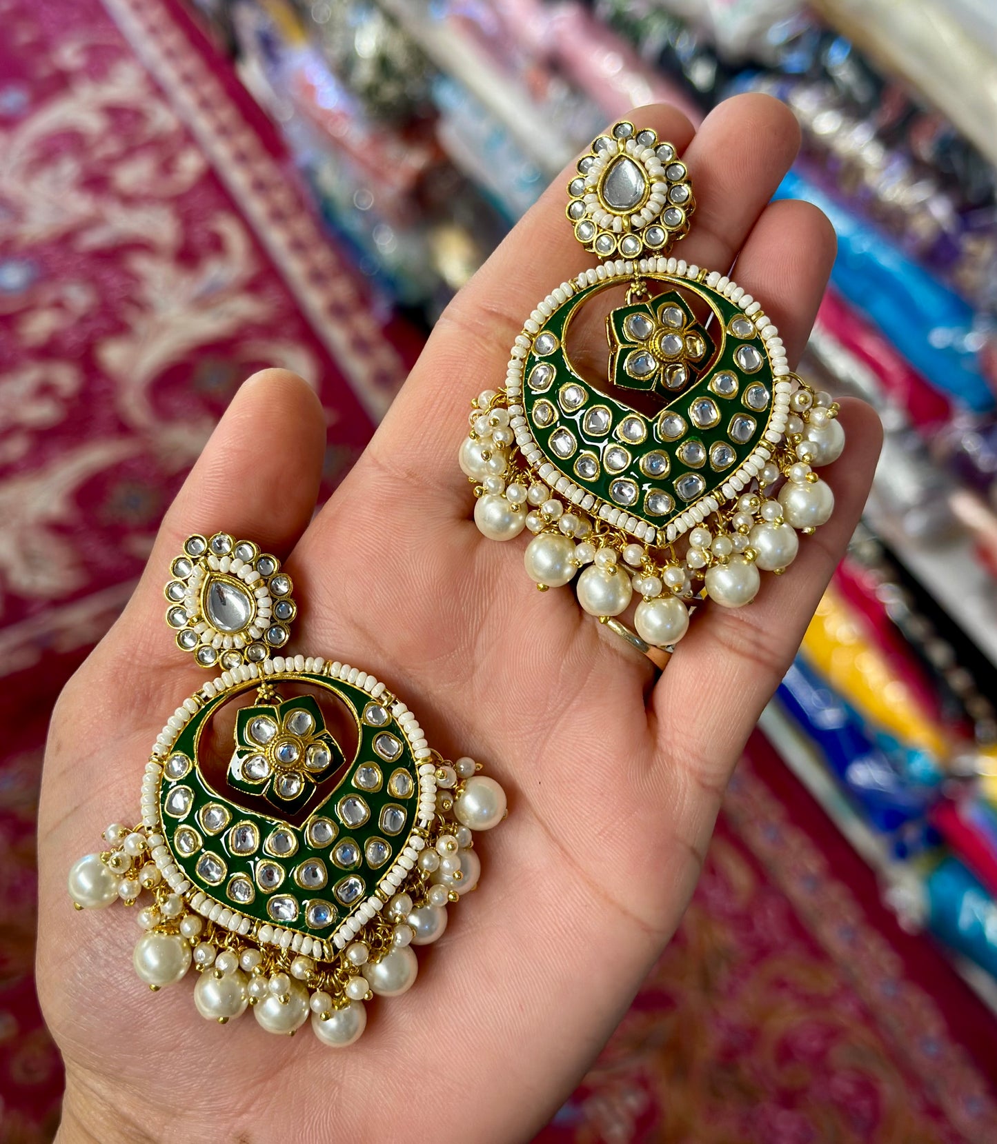 Meena kundan pearl loaded earrings in golden