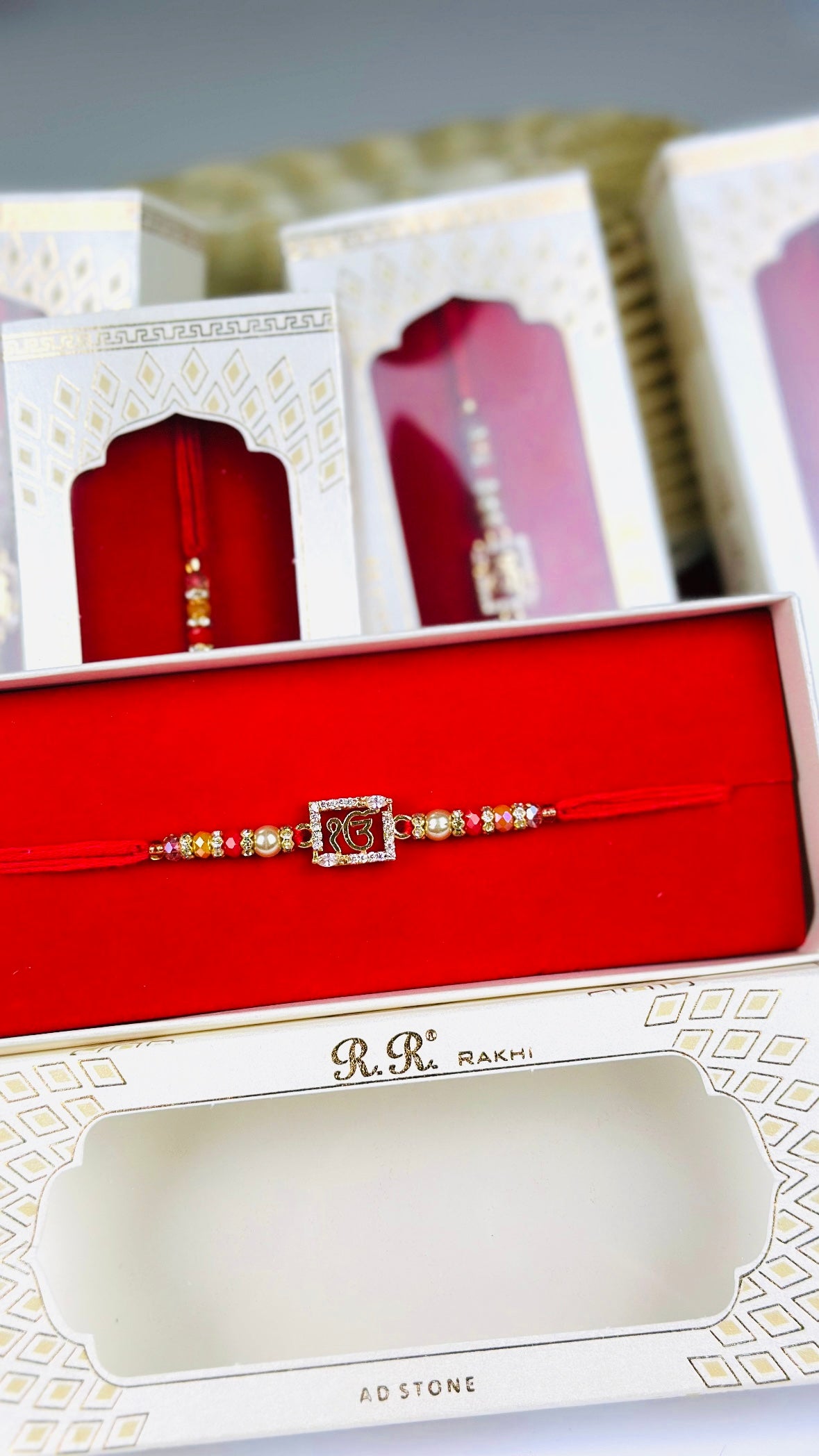 ੴ Rakhi / Rakhdi box in American Diamond - Code A66